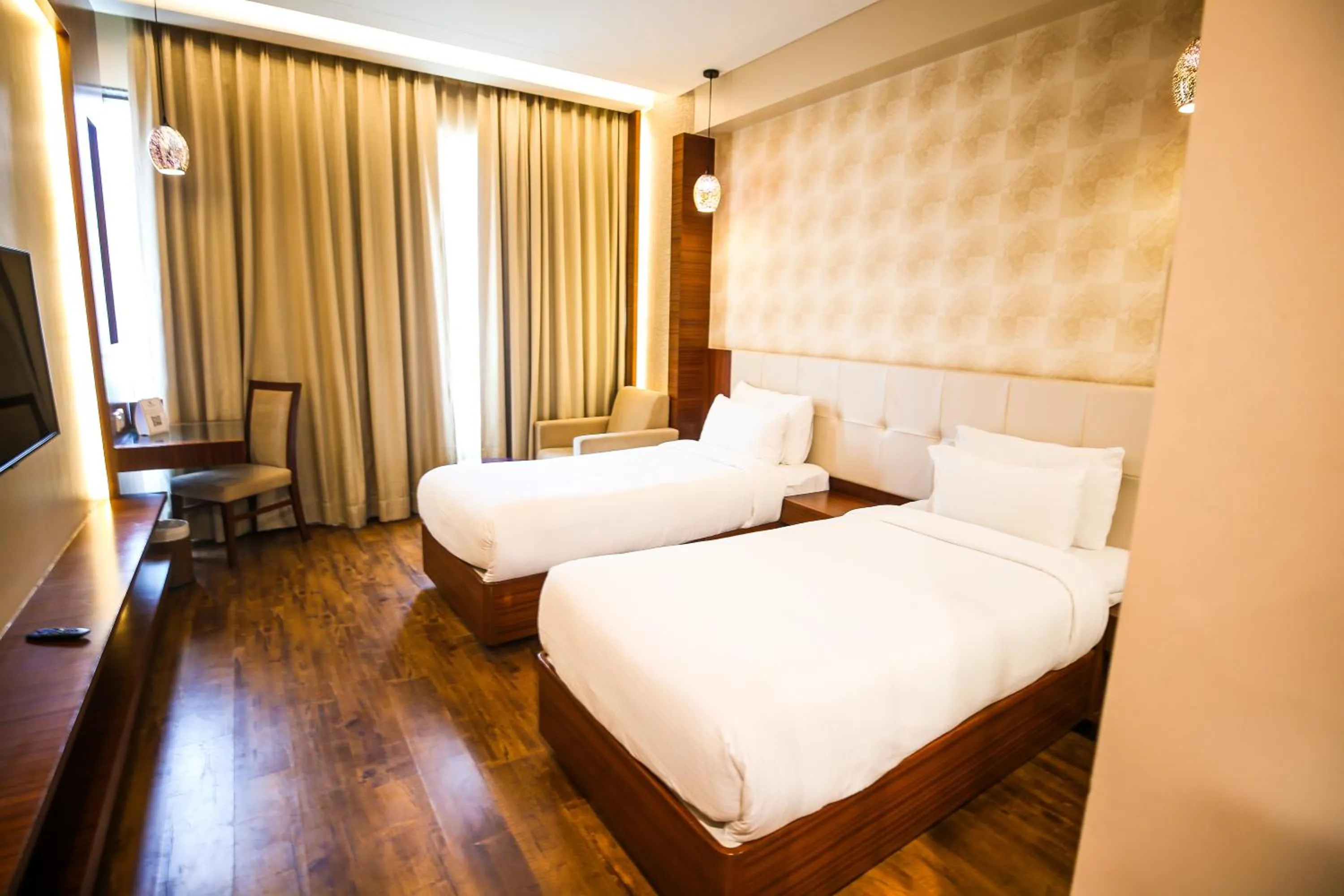 Bed in Pristine Hotel, Varanasi