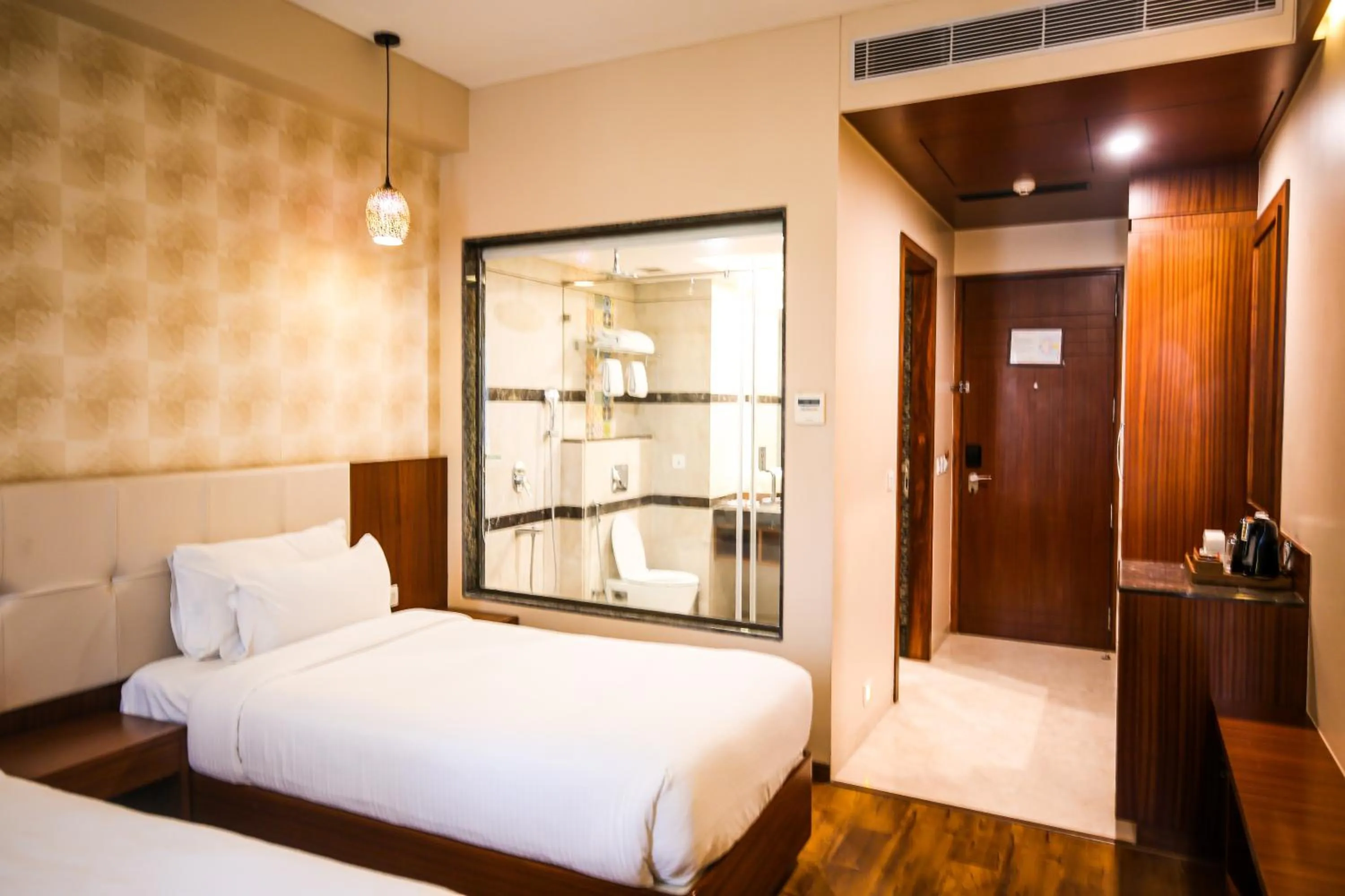 Bed in Pristine Hotel, Varanasi