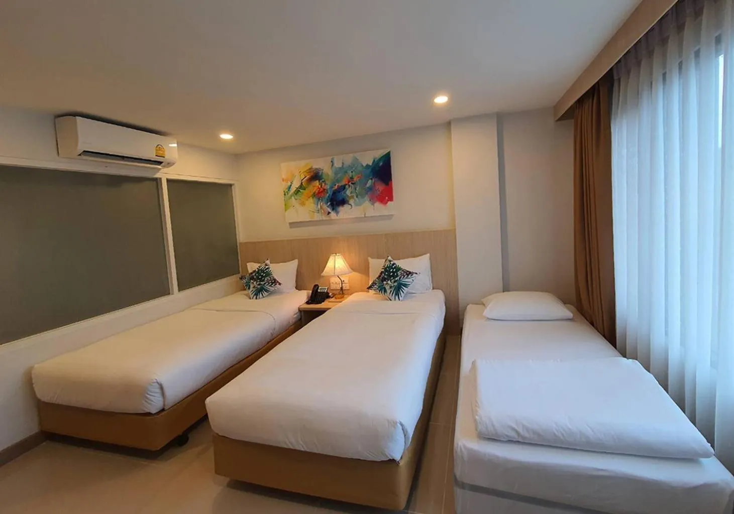 Bed in Malee Hotel