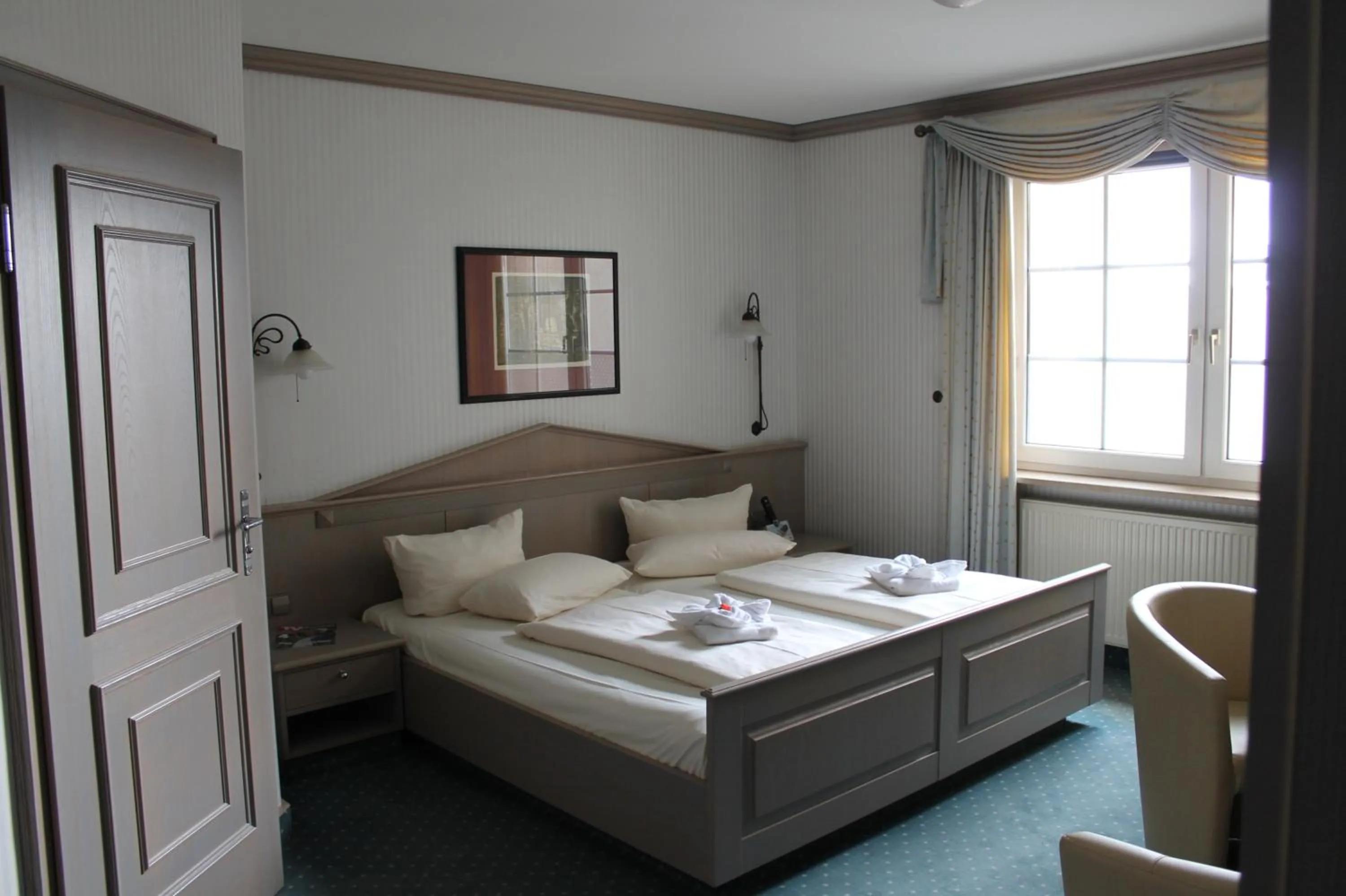 Photo of the whole room, Bed in Hotel DREI SCHWANEN - Ristorante Due Fratelli