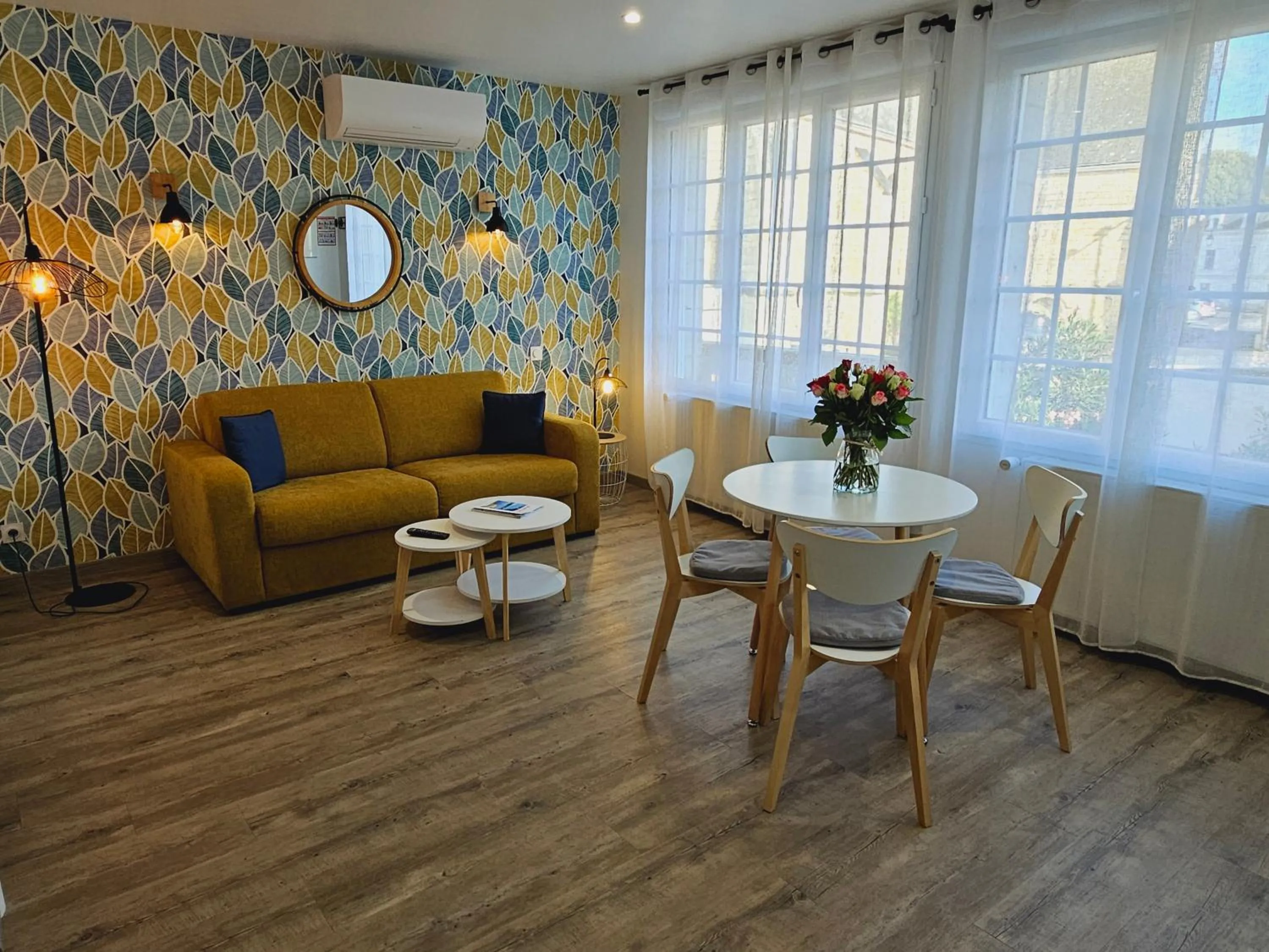 Seating area in Logis Loire Hotel - Les Cocottes Restaurant