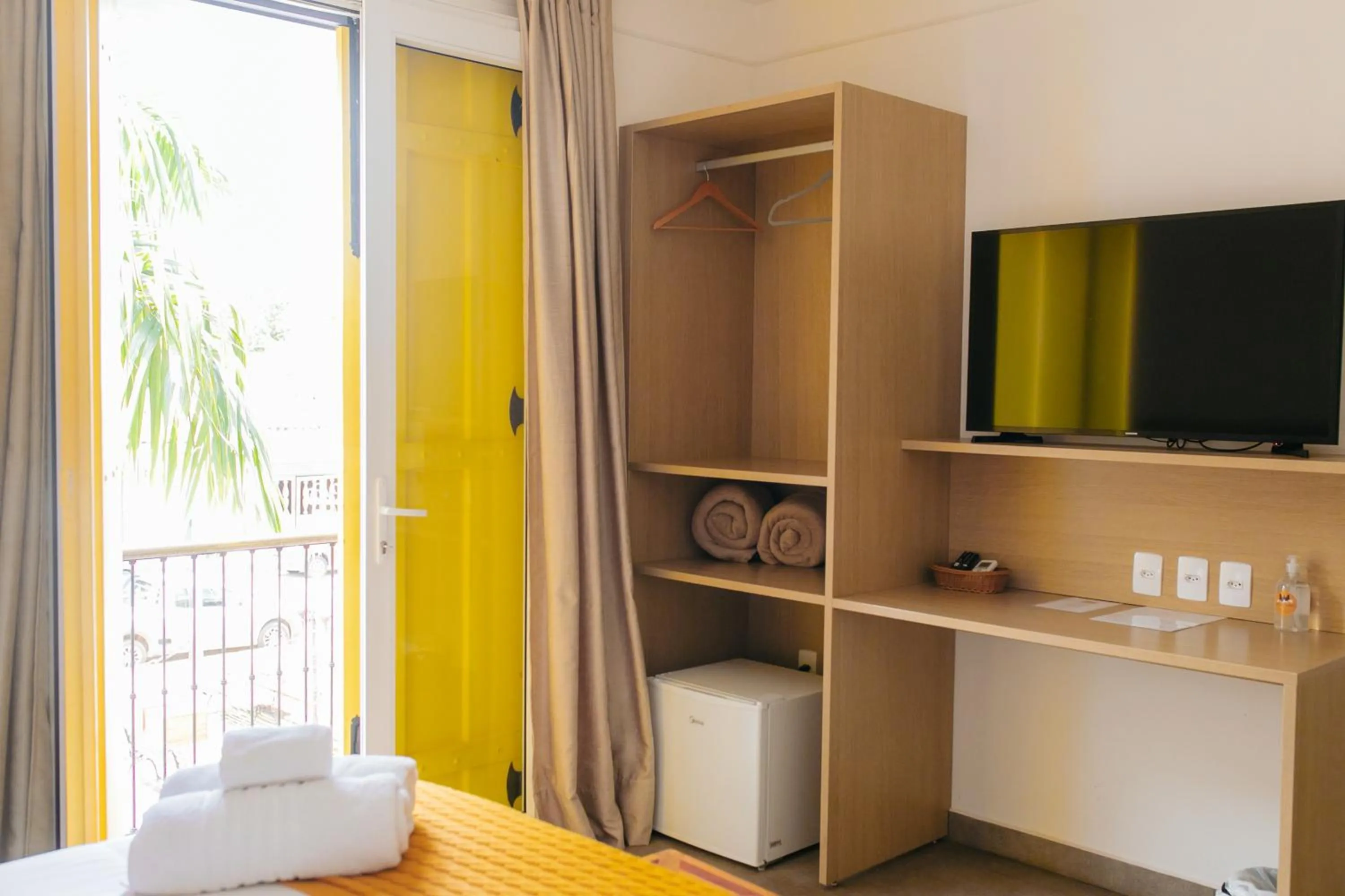 Bed in Pousada Relicário