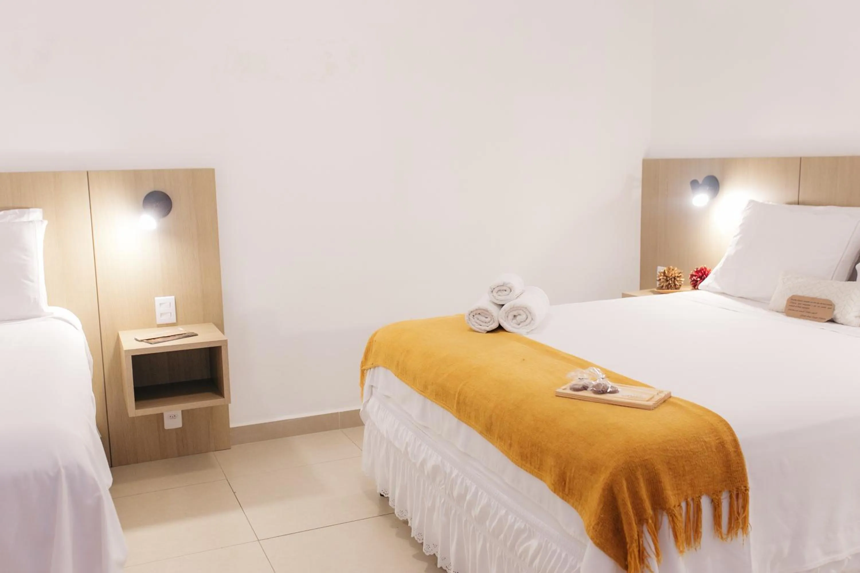 Bed in Pousada Relicário