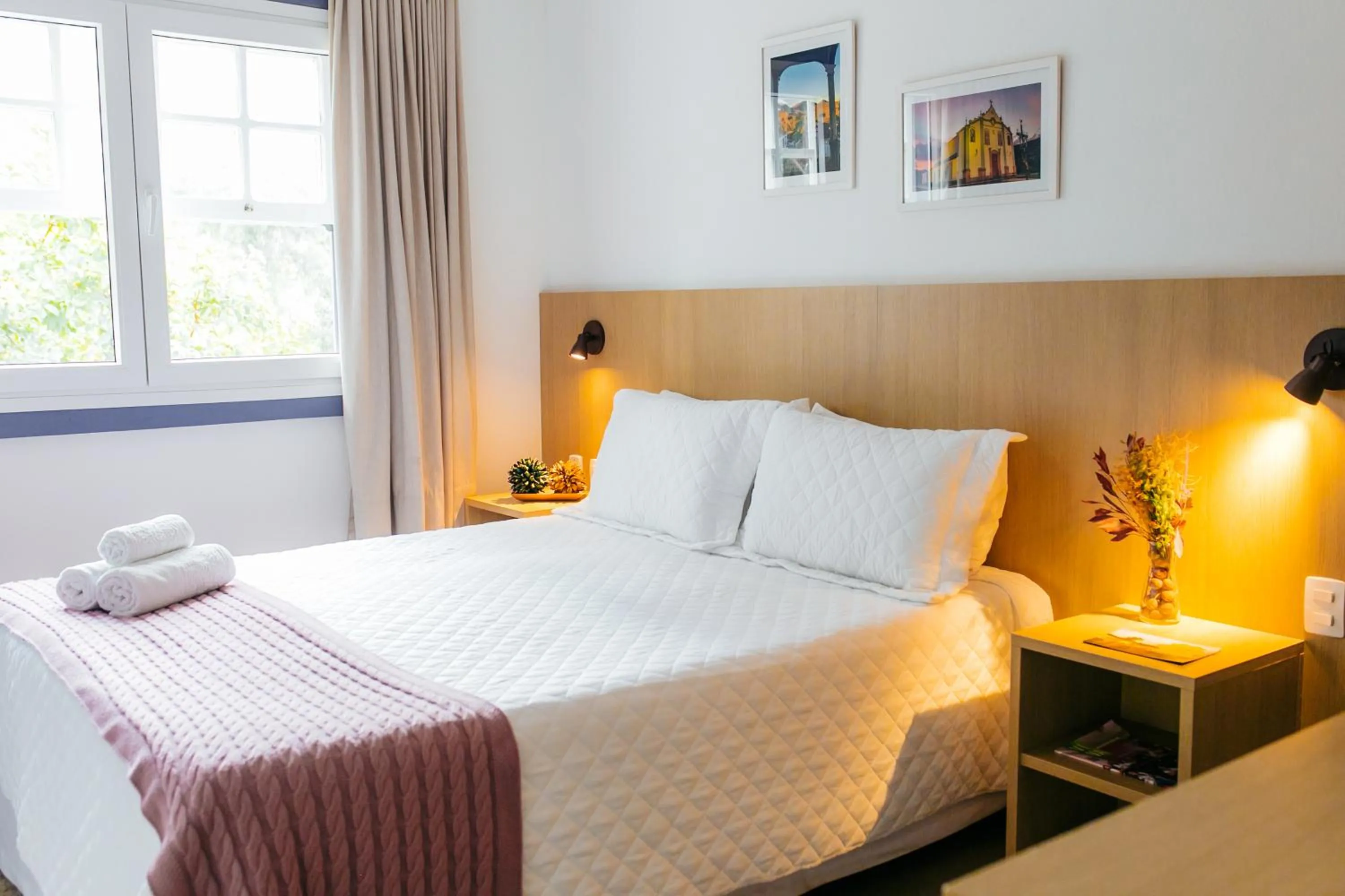 Bed in Pousada Relicário