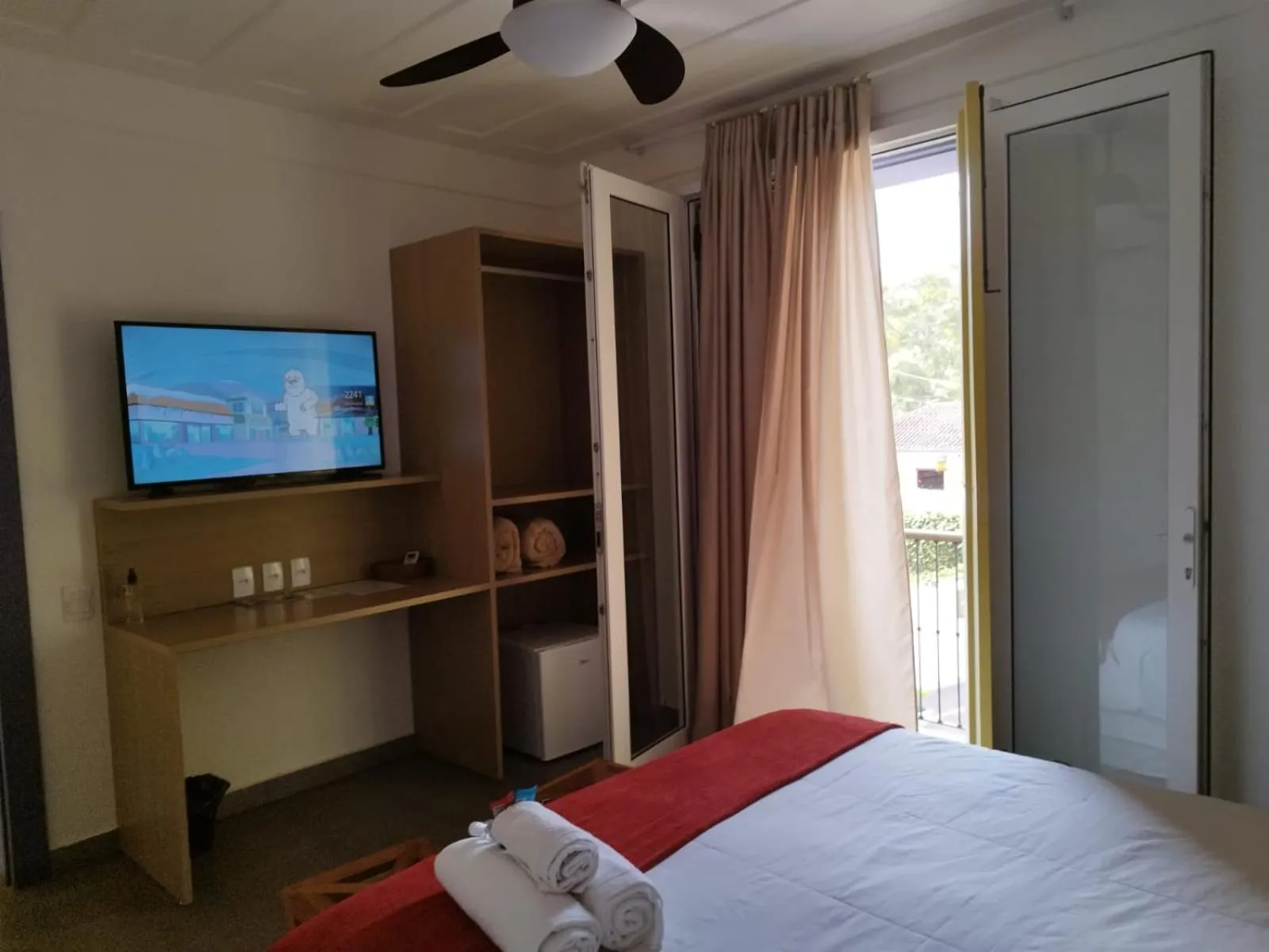 Bed in Pousada Relicário