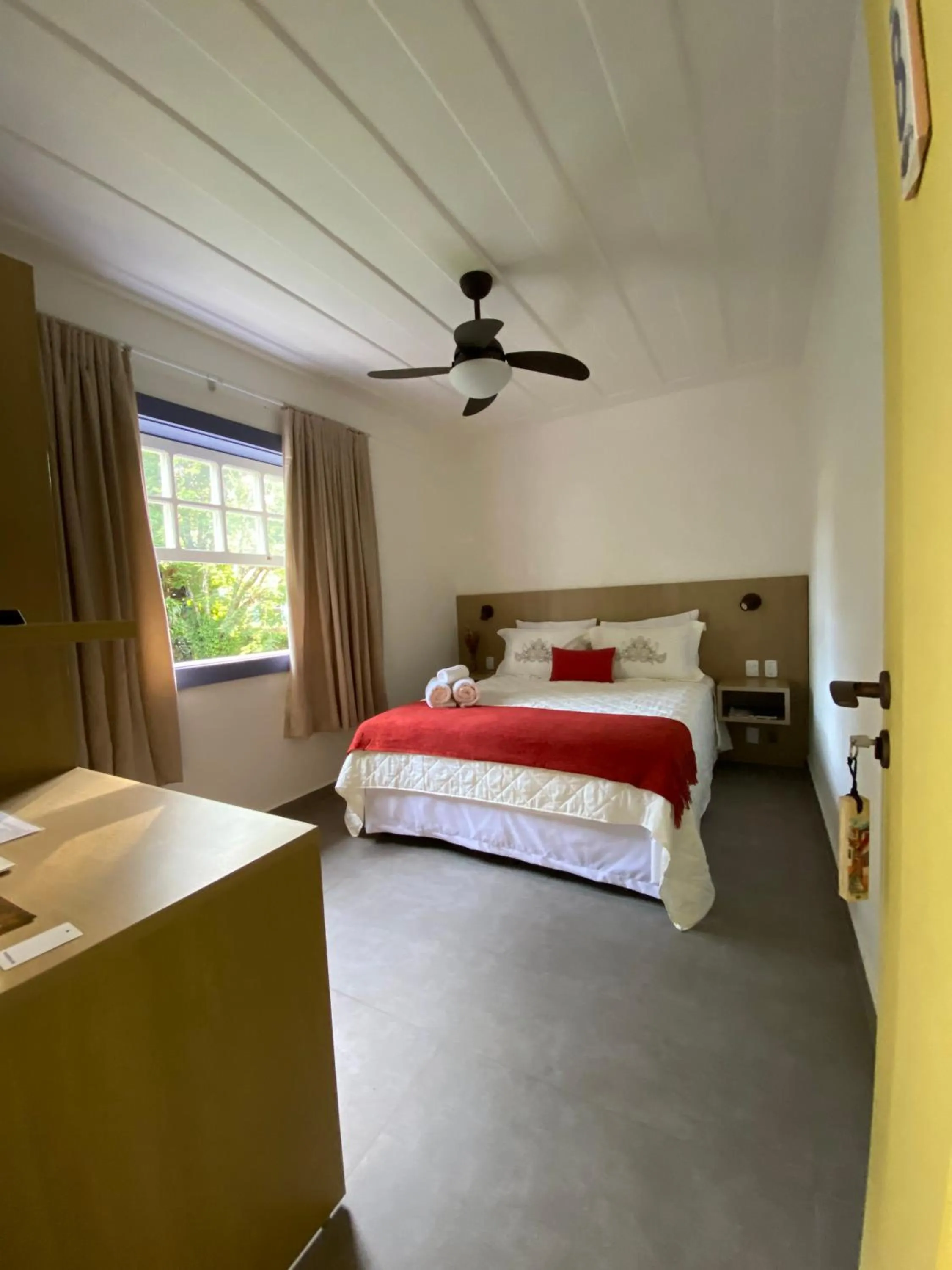 Bed in Pousada Relicário