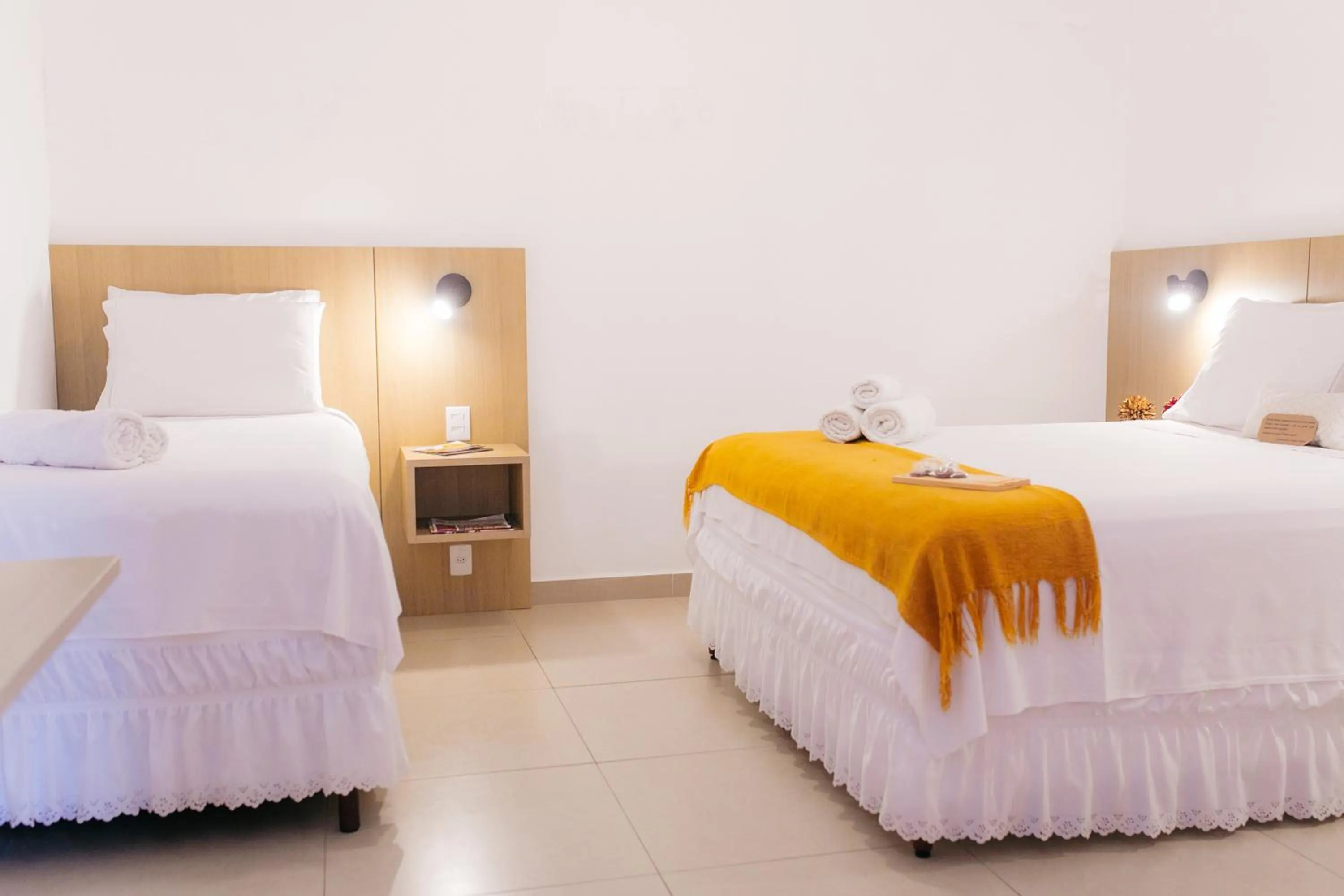 Bed in Pousada Relicário