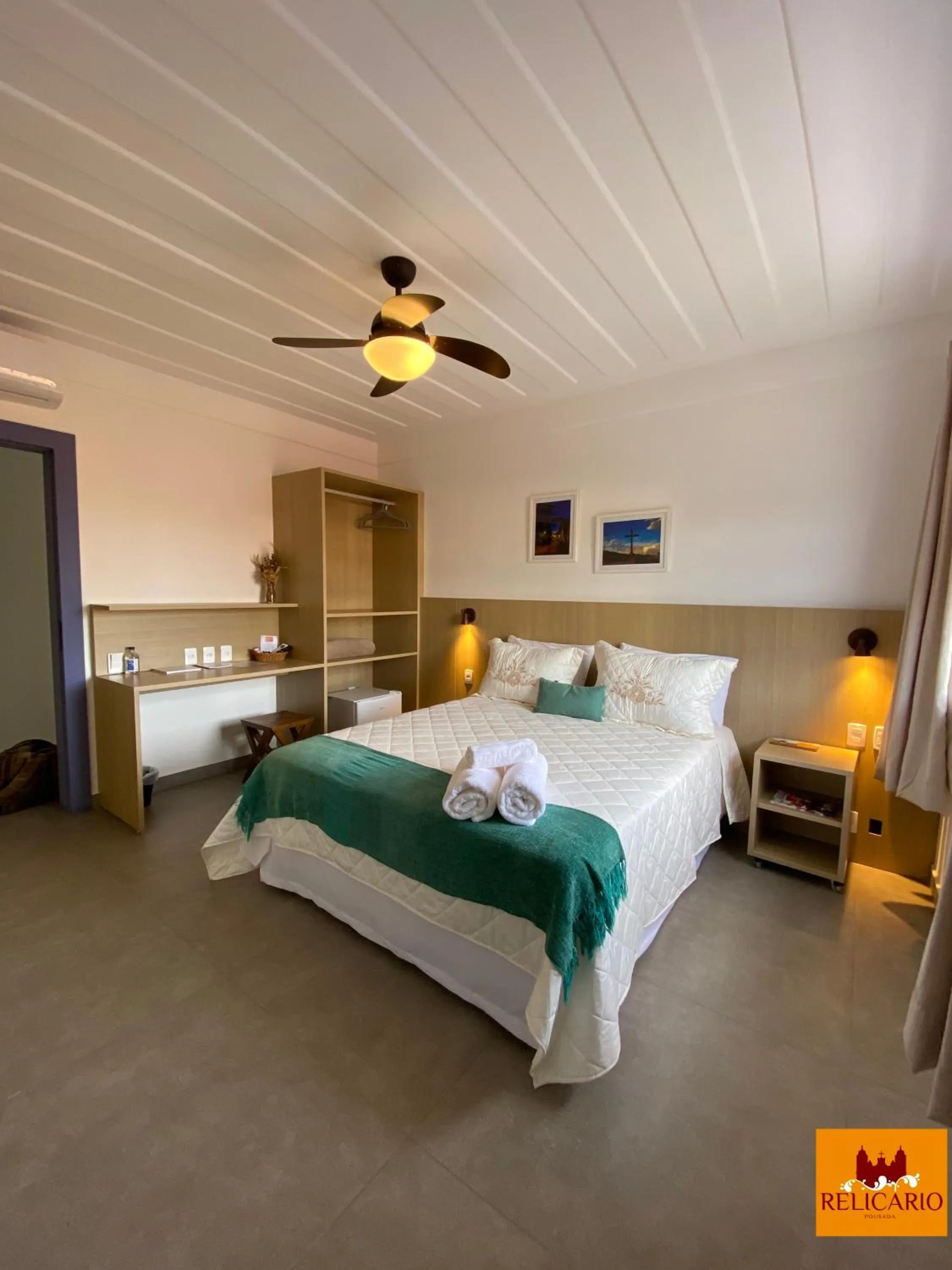 Bed in Pousada Relicário