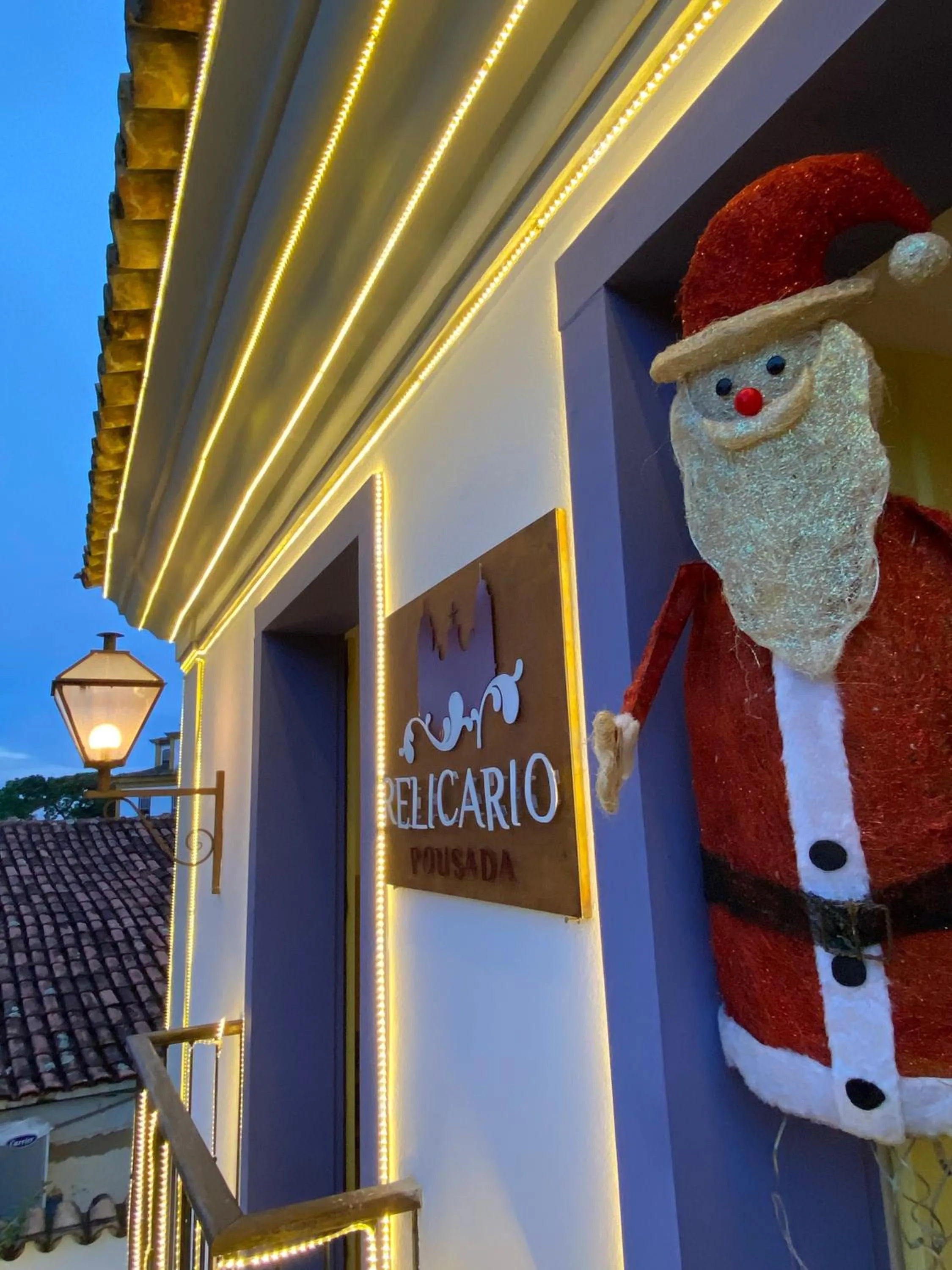 Property logo or sign in Pousada Relicário