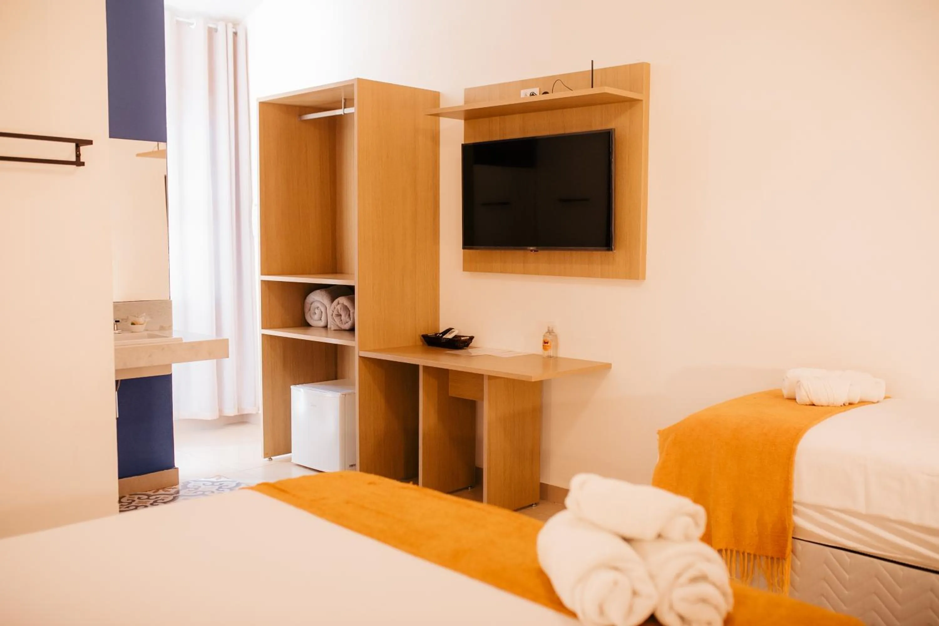 Bed in Pousada Relicário