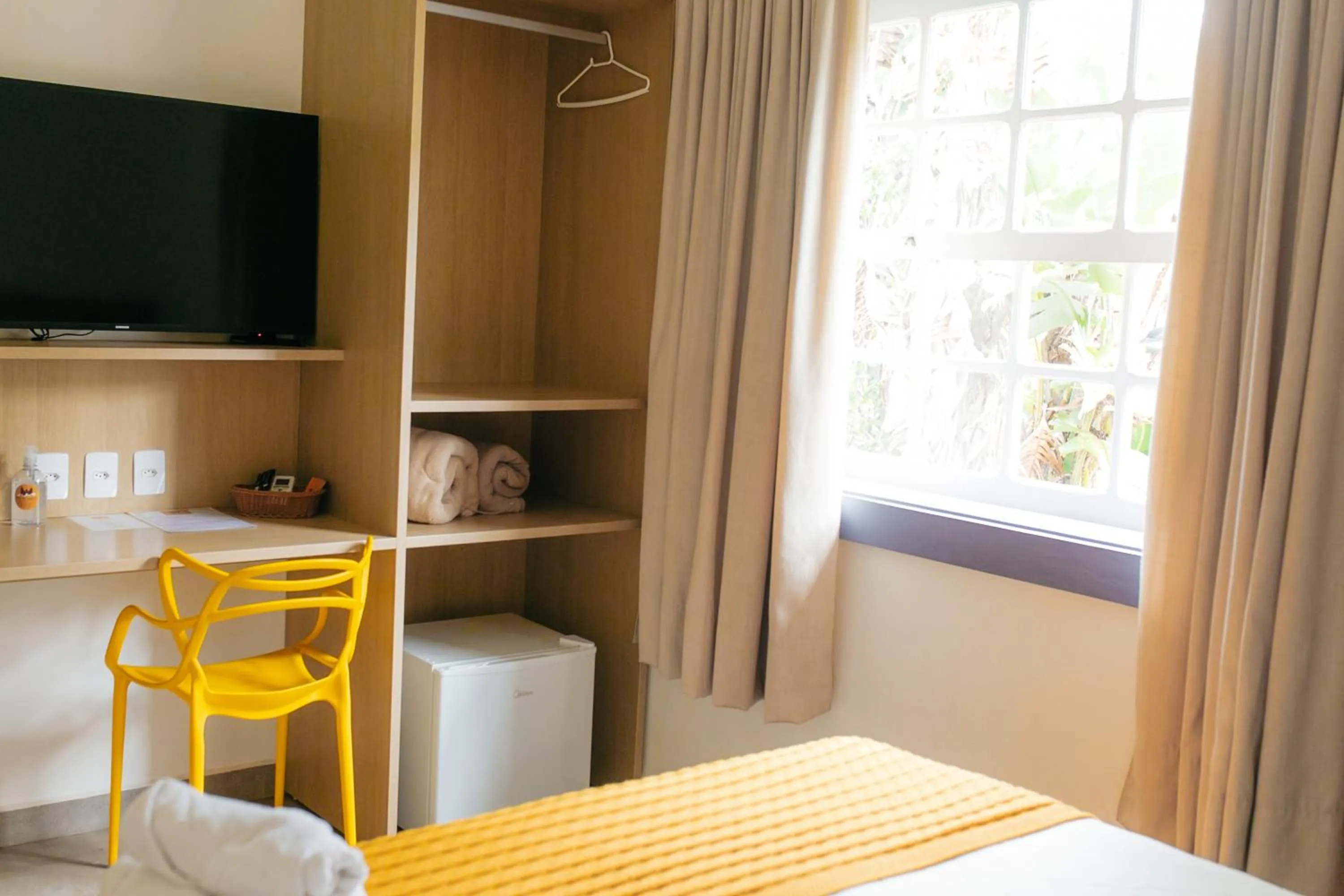 Bed in Pousada Relicário