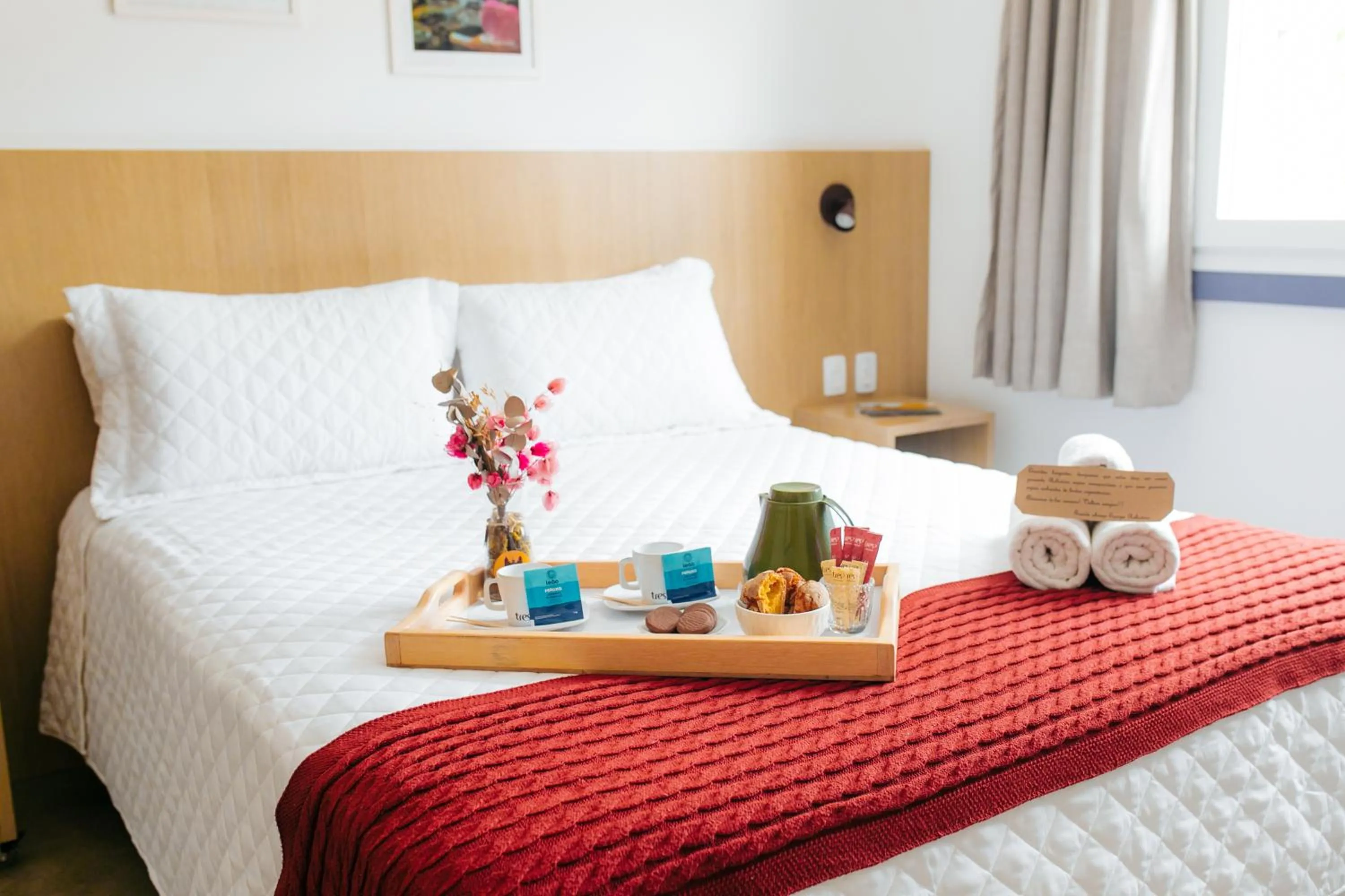 Bed in Pousada Relicário