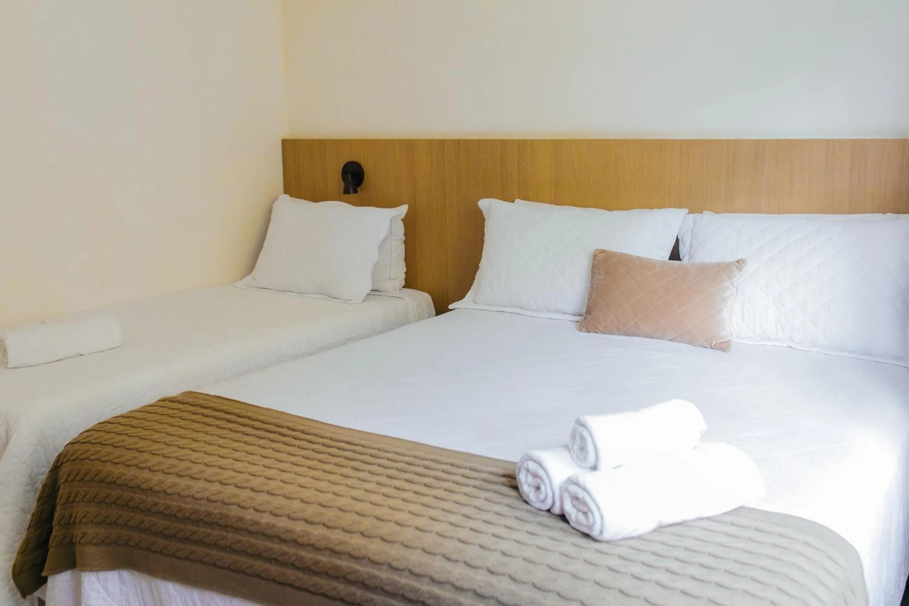 Bed in Pousada Relicário