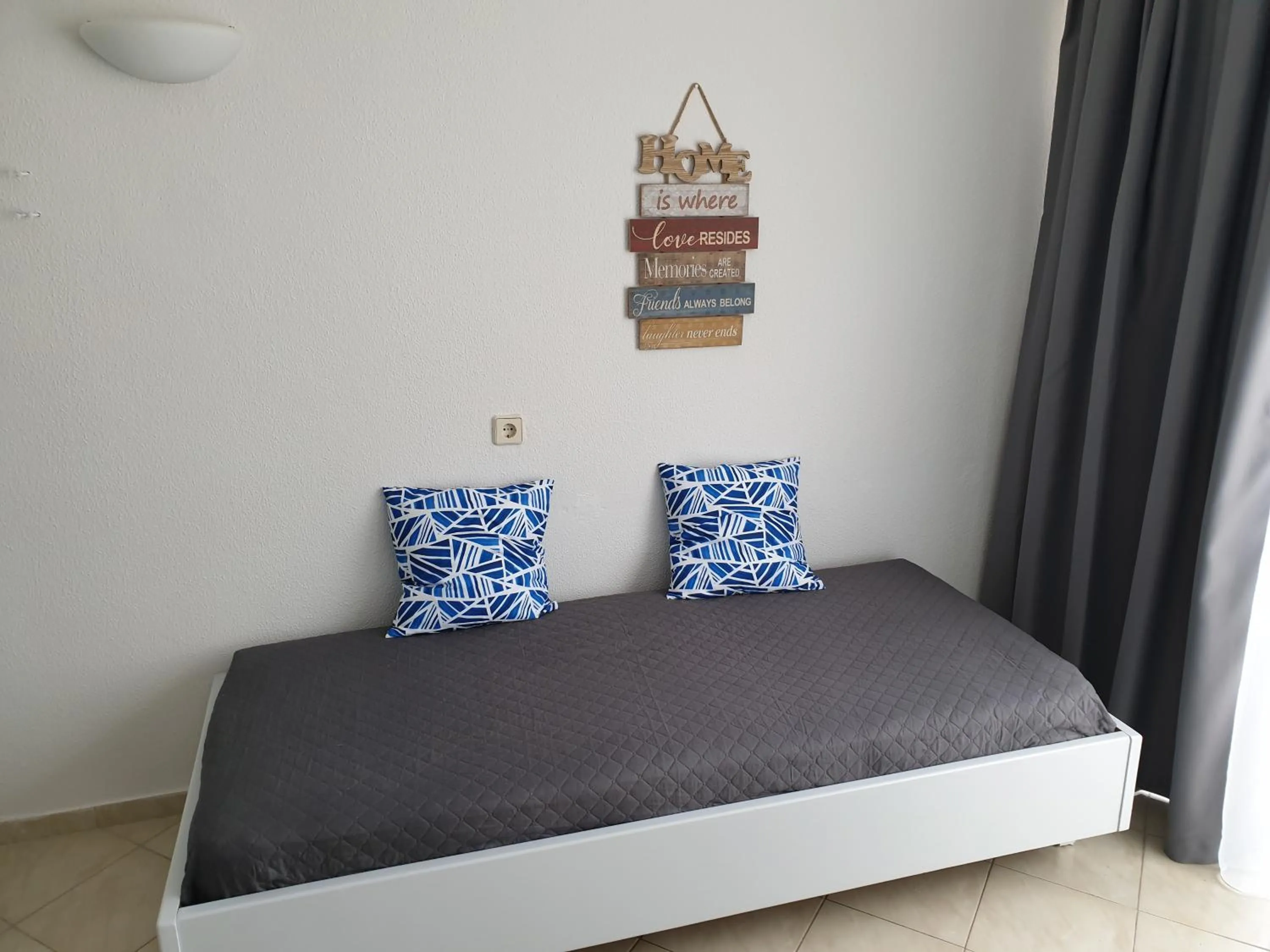 Bed in BLUE EYES APARTMENTS