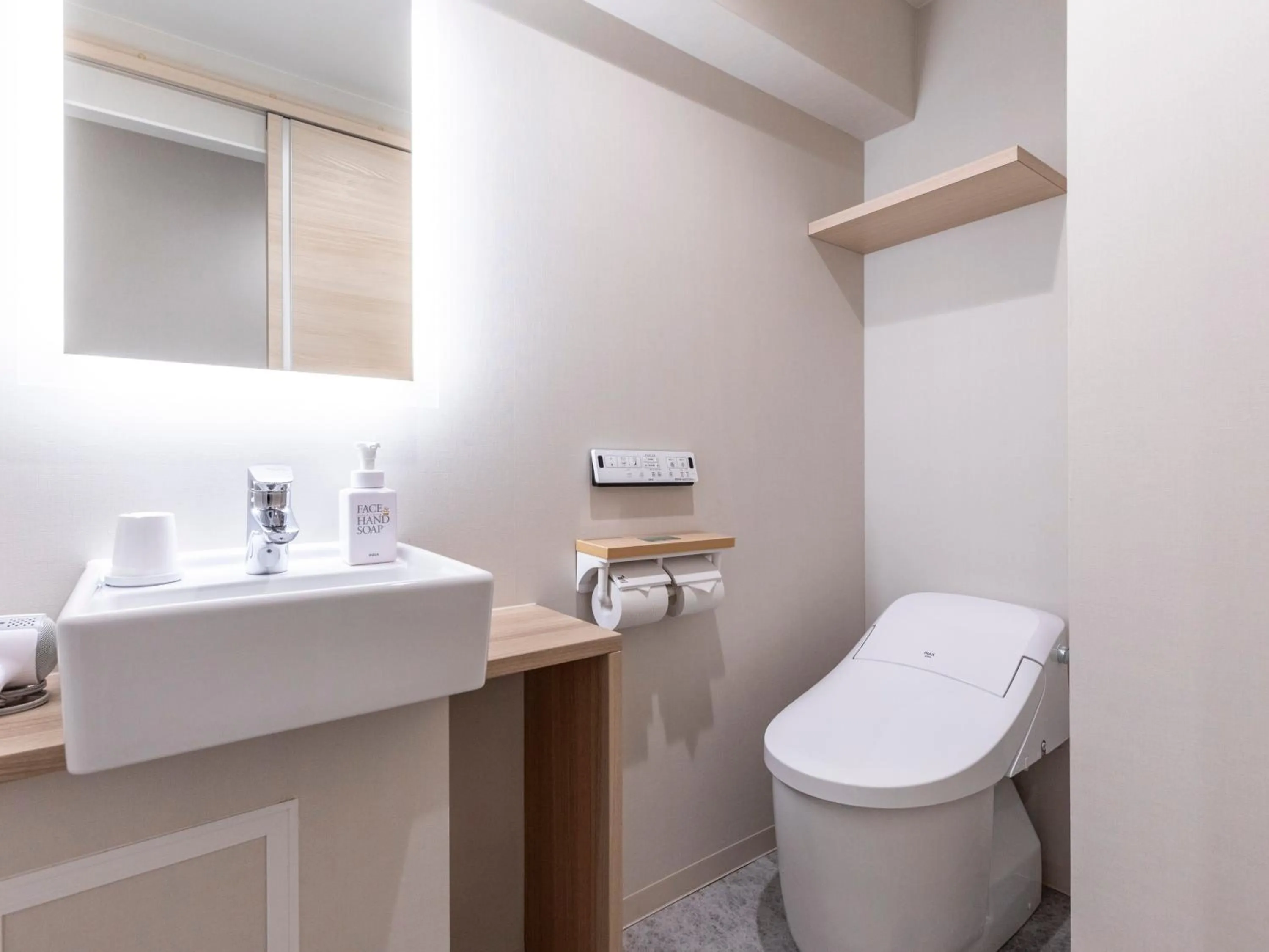 Toilet in Trust Hotel