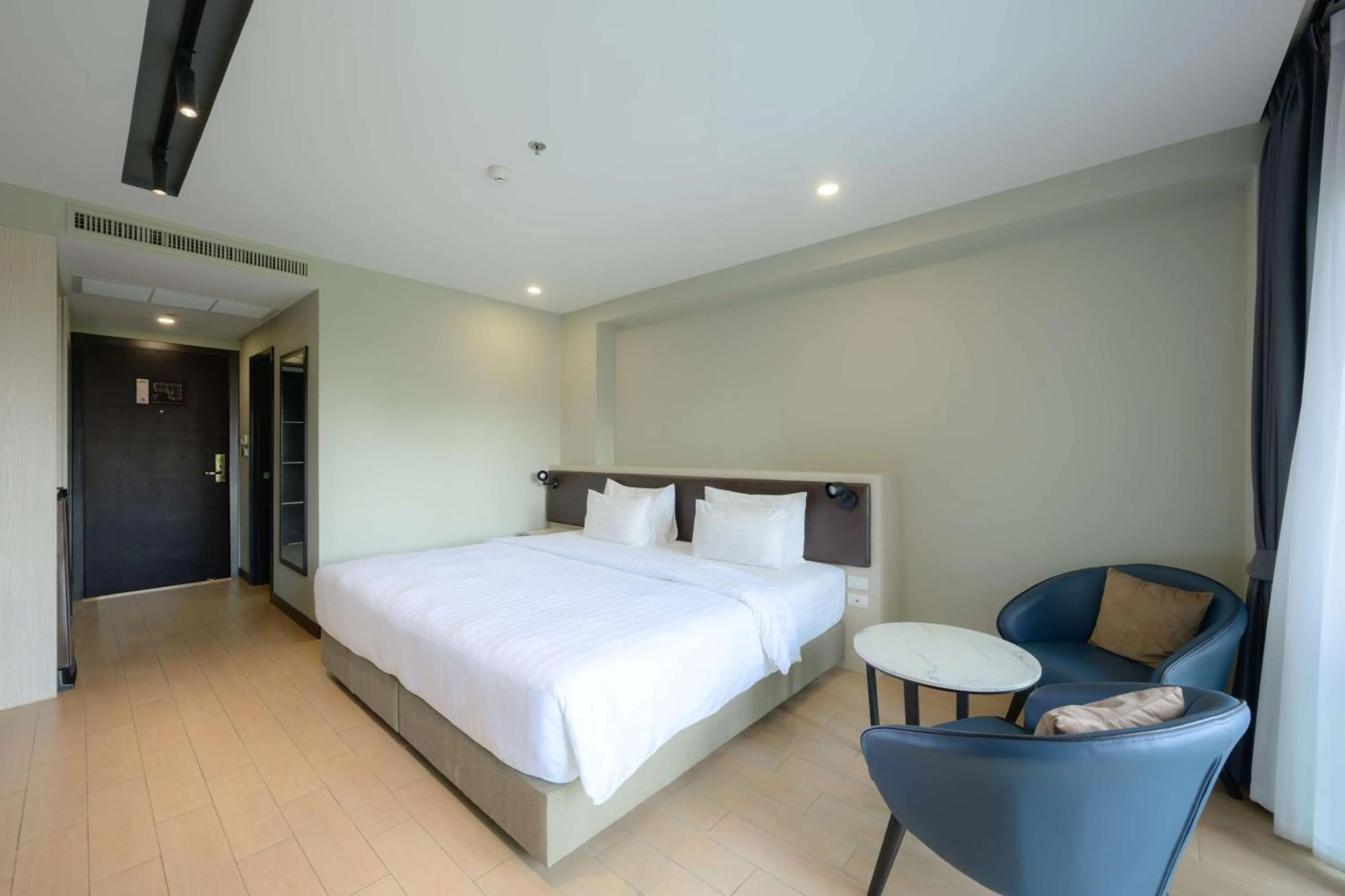 Bedroom, Bed in Lewit Hotel Pattaya, a member of Radisson Individuals