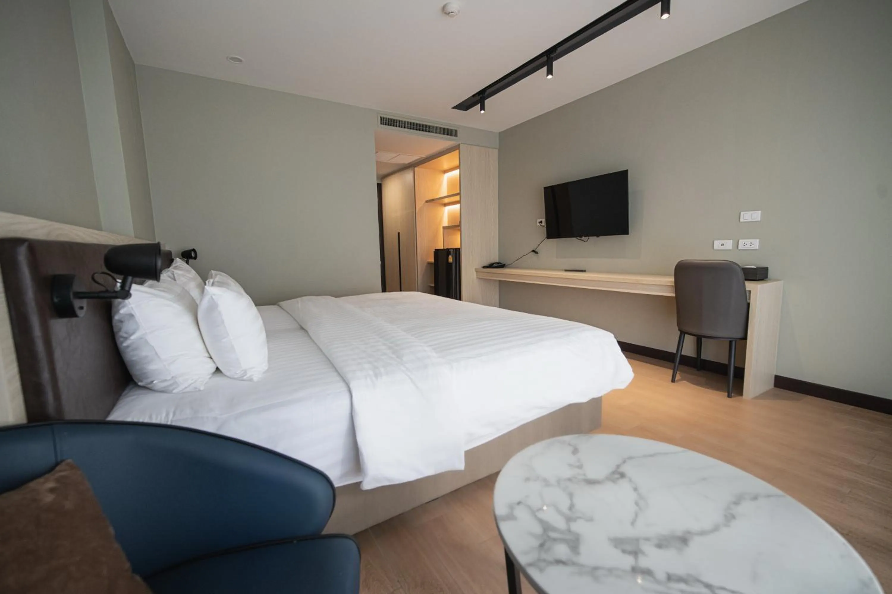 Bed in Lewit Hotel Pattaya, a member of Radisson Individuals