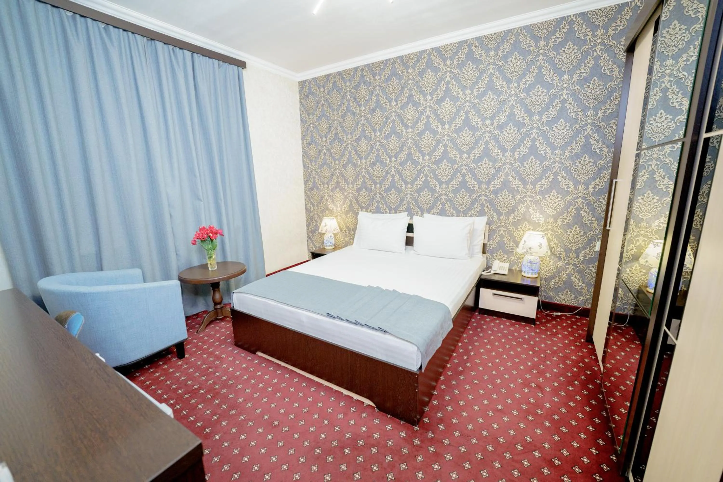 Bed in Welcome Inn Hotel