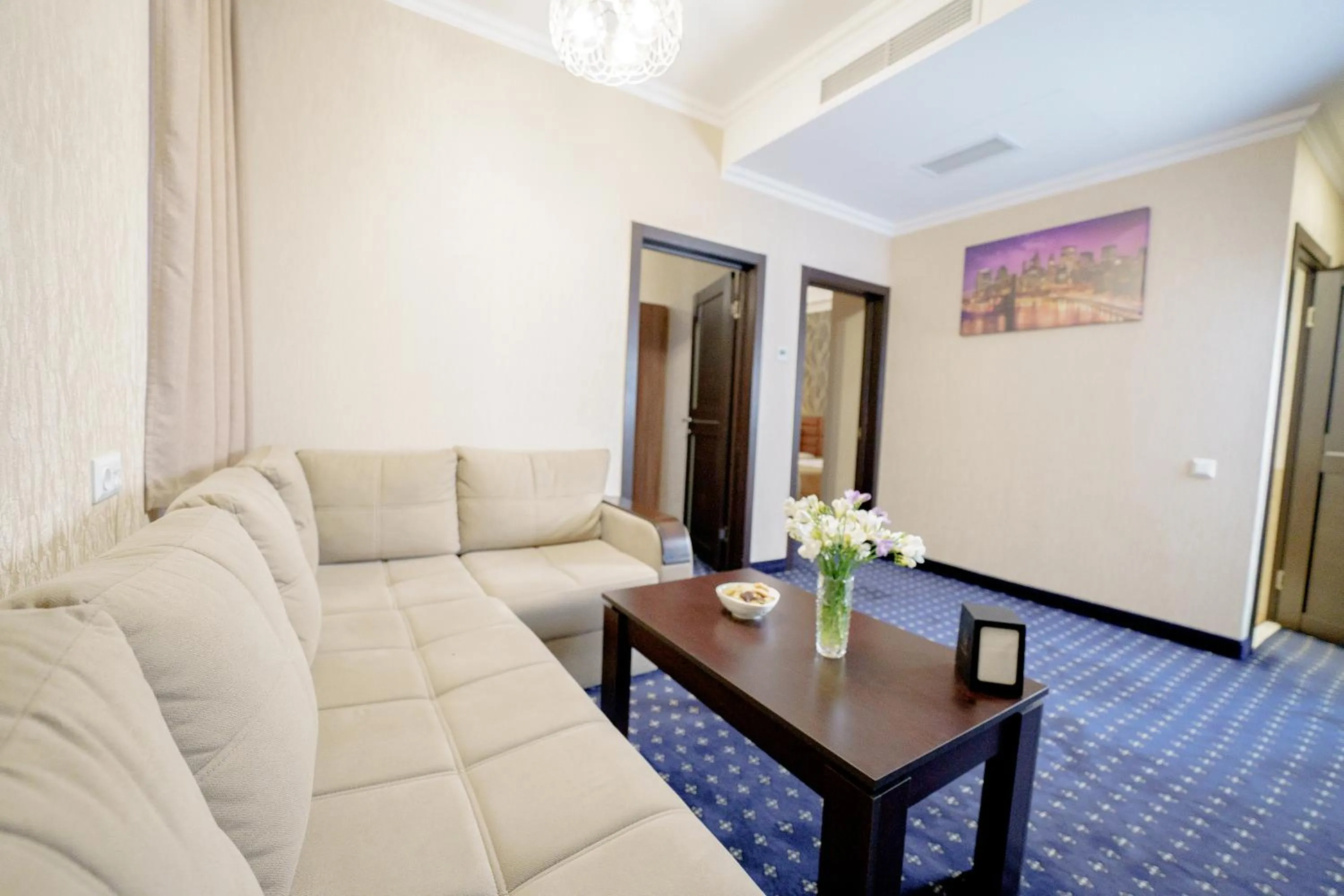 Living room in Welcome Inn Hotel