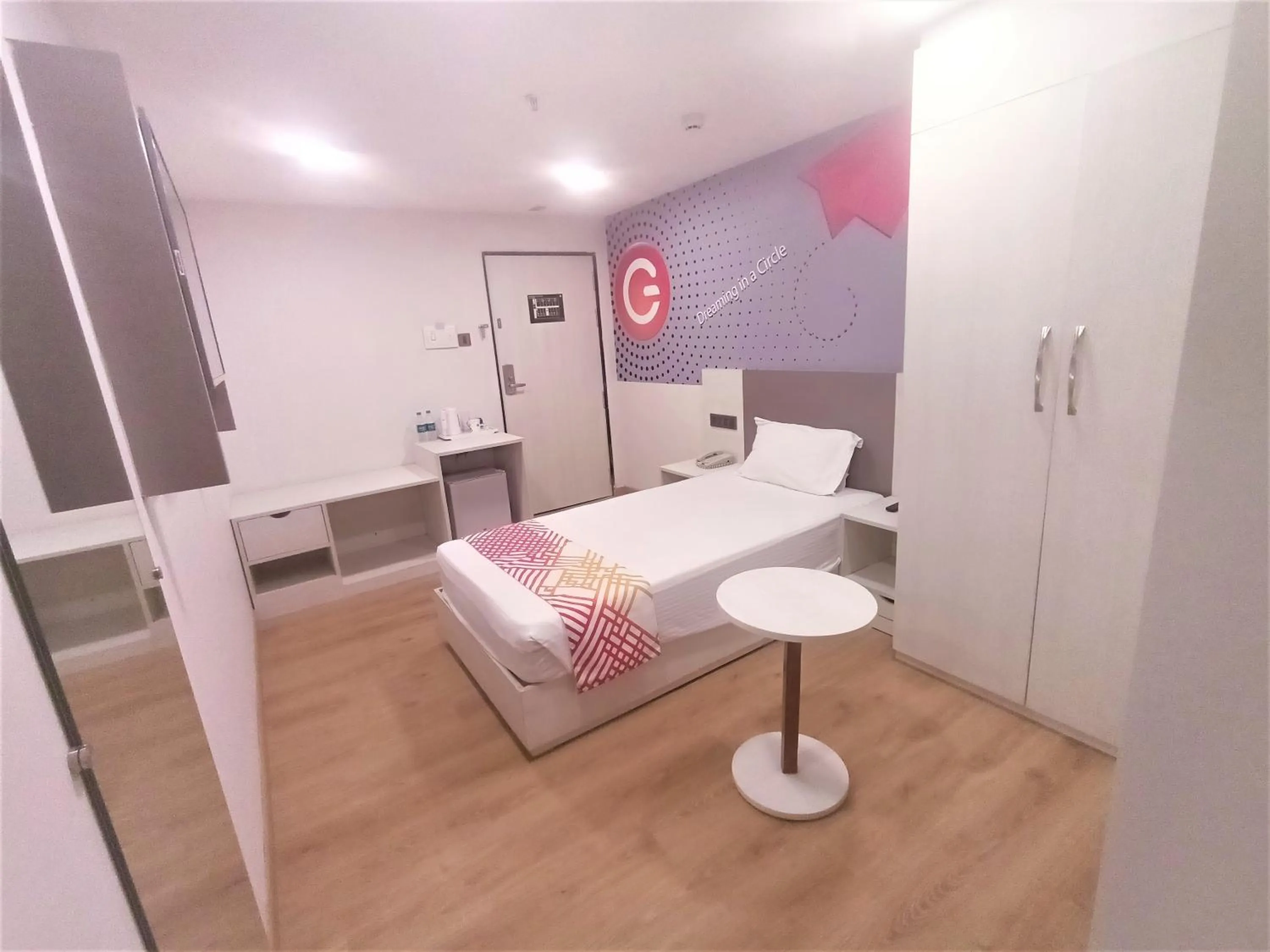 Living room, Bed in Ginger Vishakhapatnam Gajuwaka