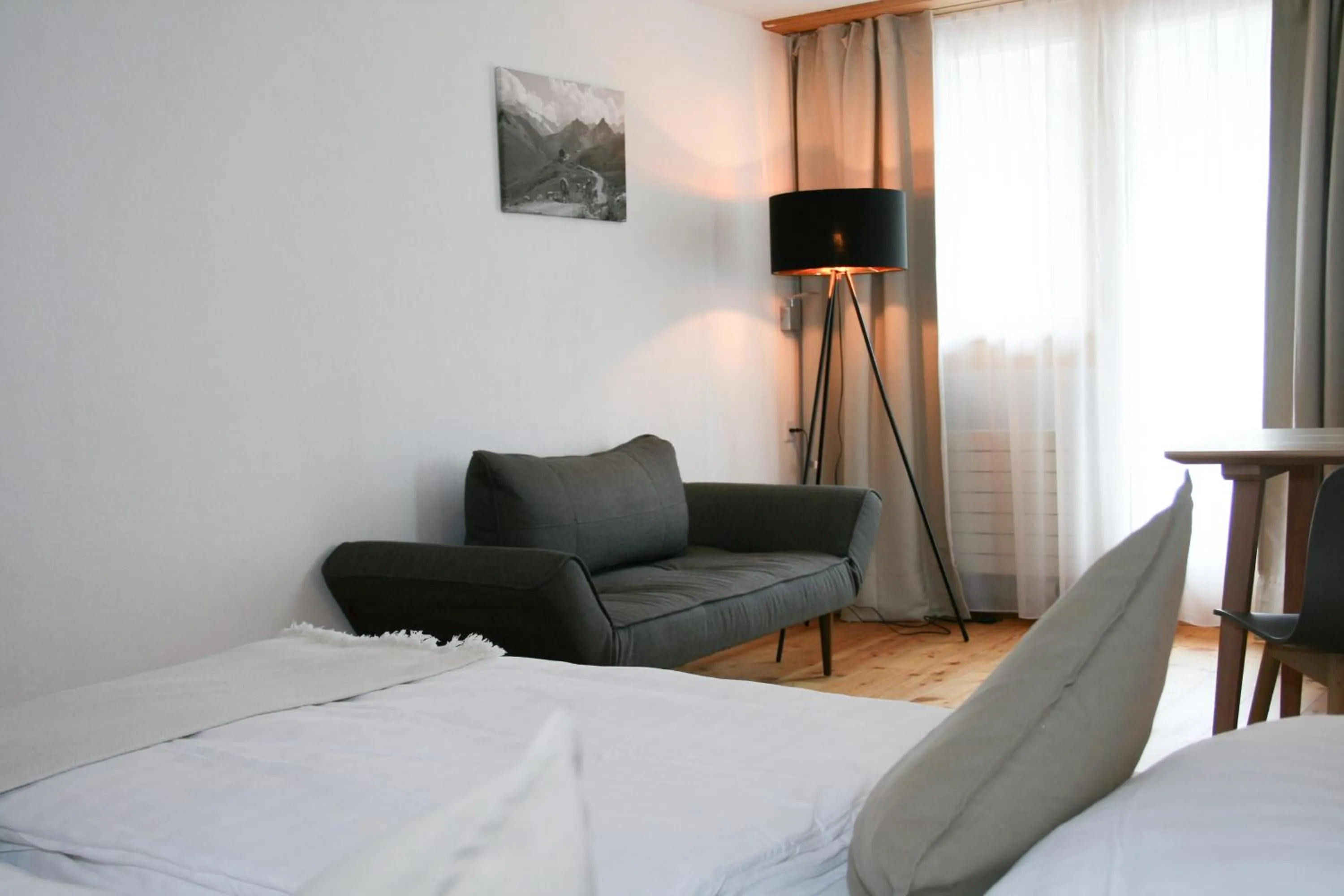 Living room, Bed in Hotel Solaria