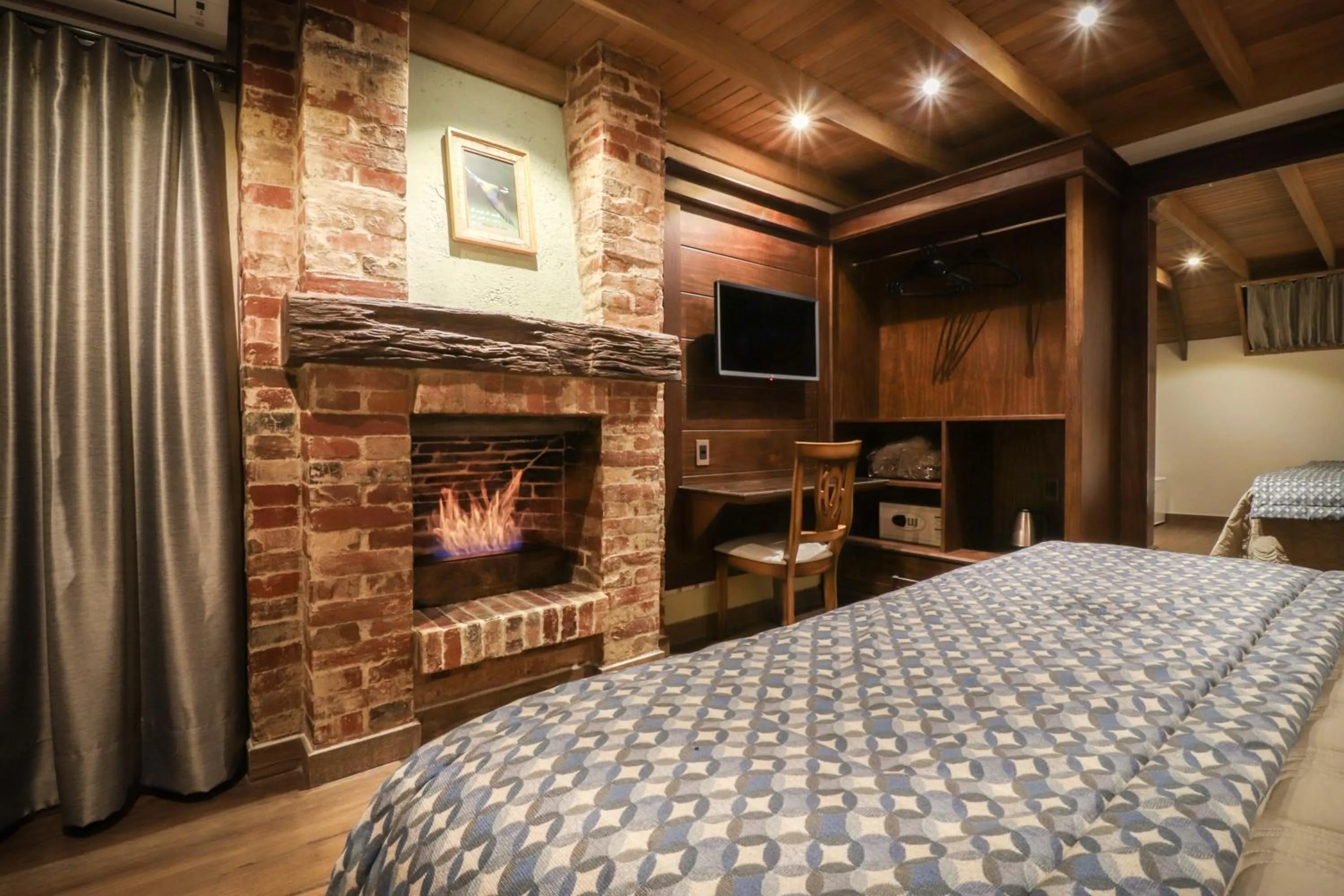 Bed in Pousada Serra Paradiso