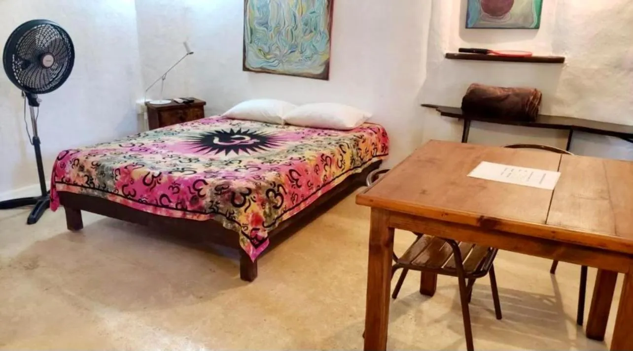 Photo of the whole room, Bed in La Quinta Orquídea