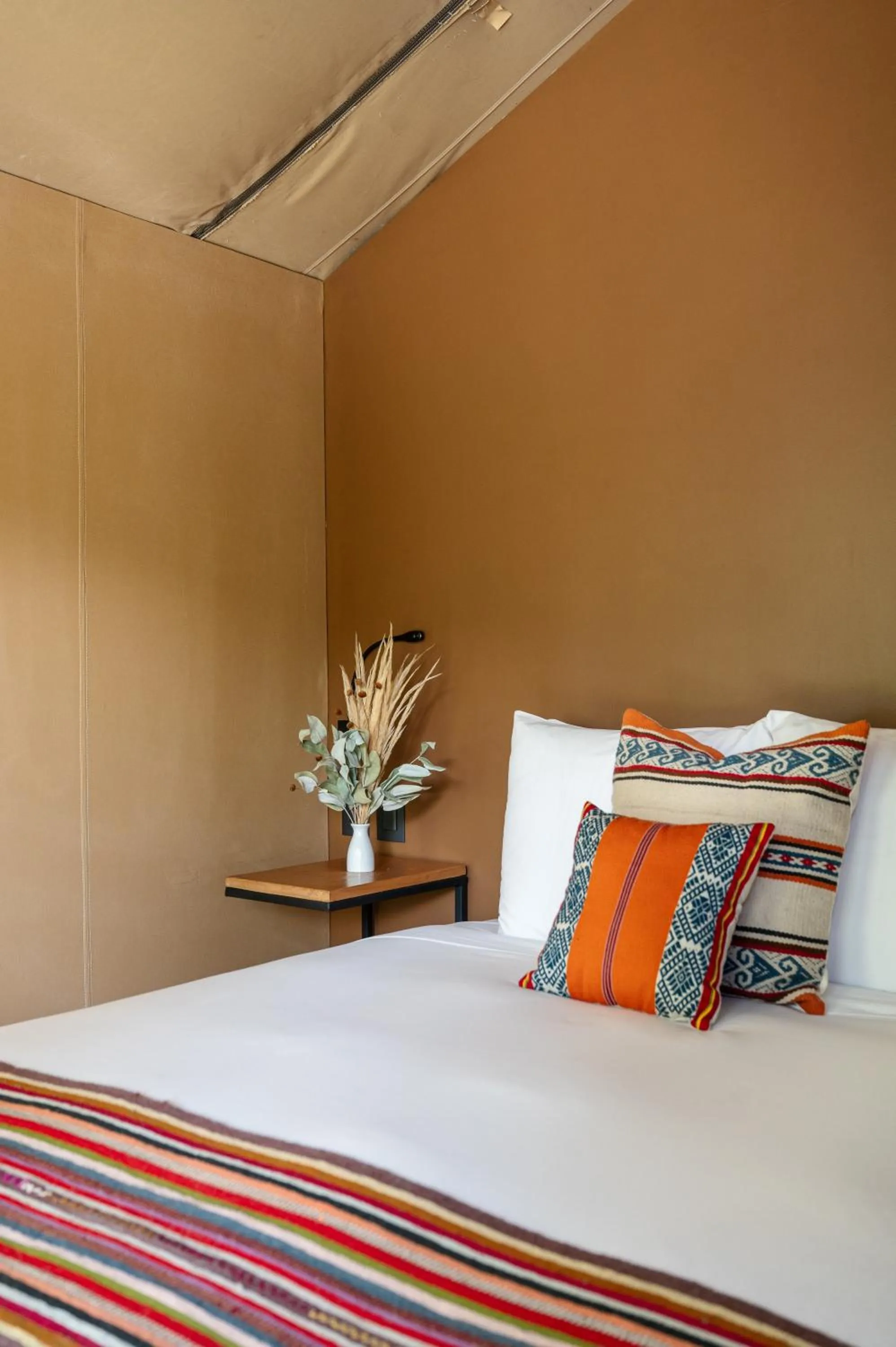 Bed in Las Qolqas EcoResort Ollantaytambo