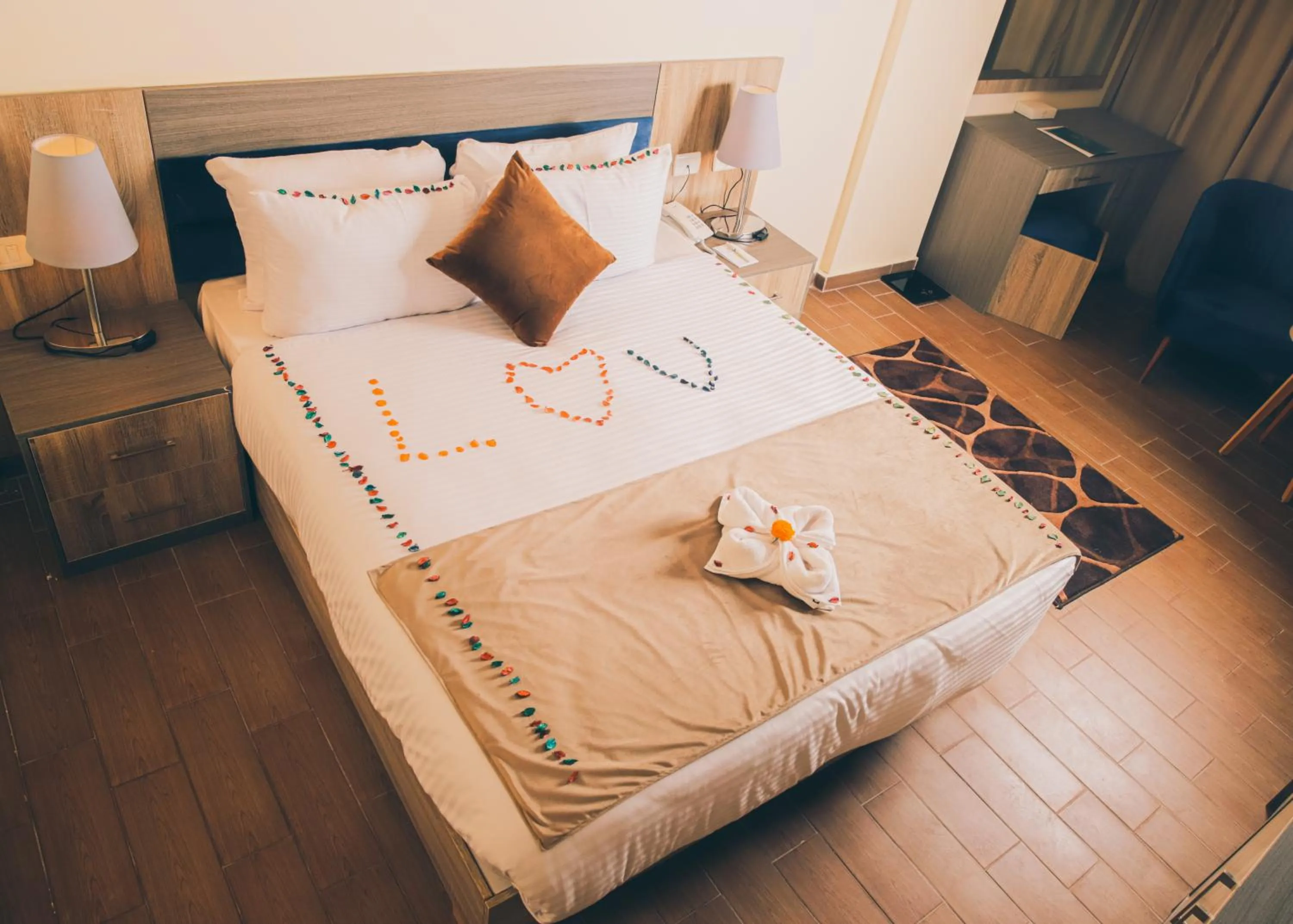 Bed in Jewel Green Mountain Hotel