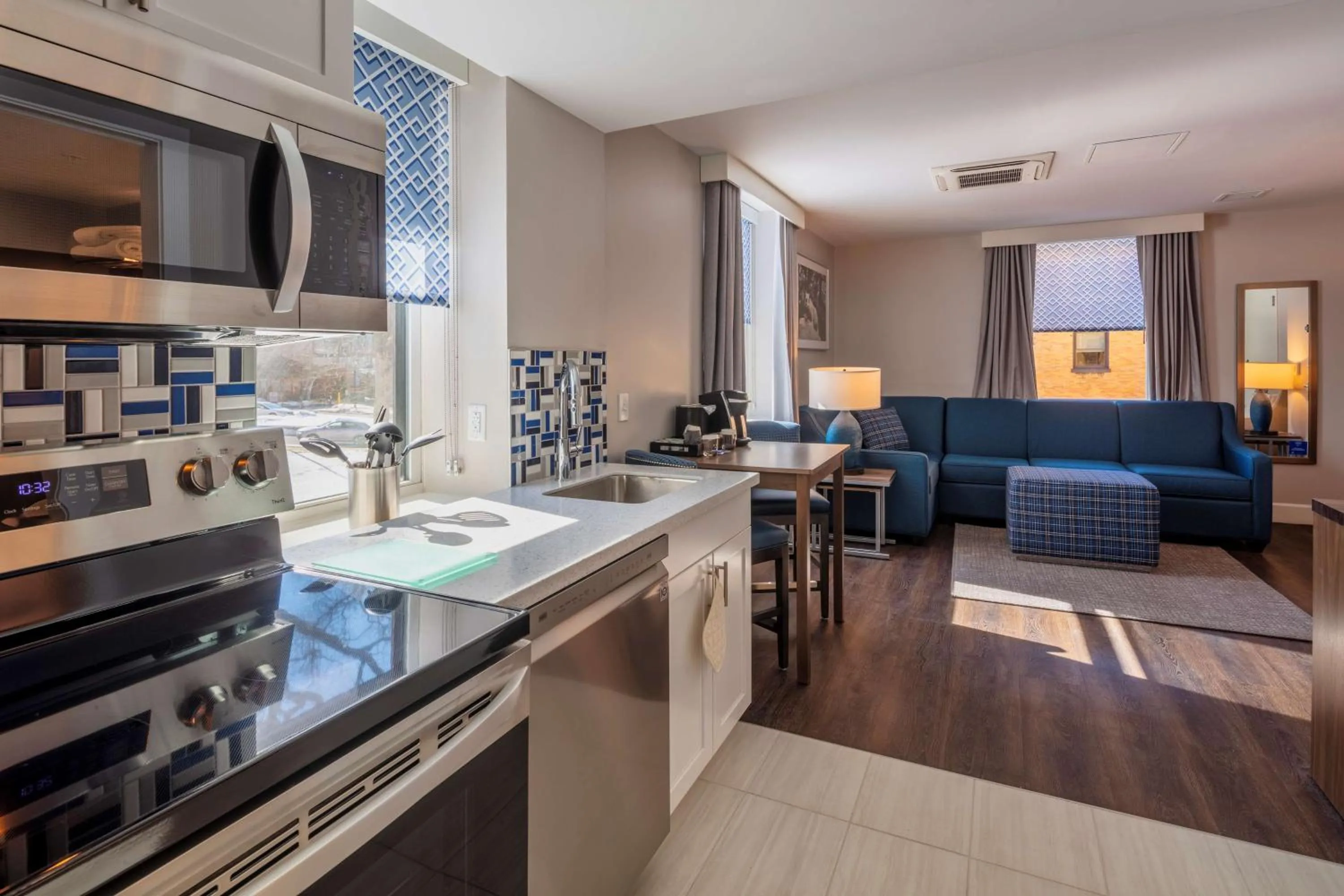 Living room in Scholar State College, Tapestry Collection by Hilton