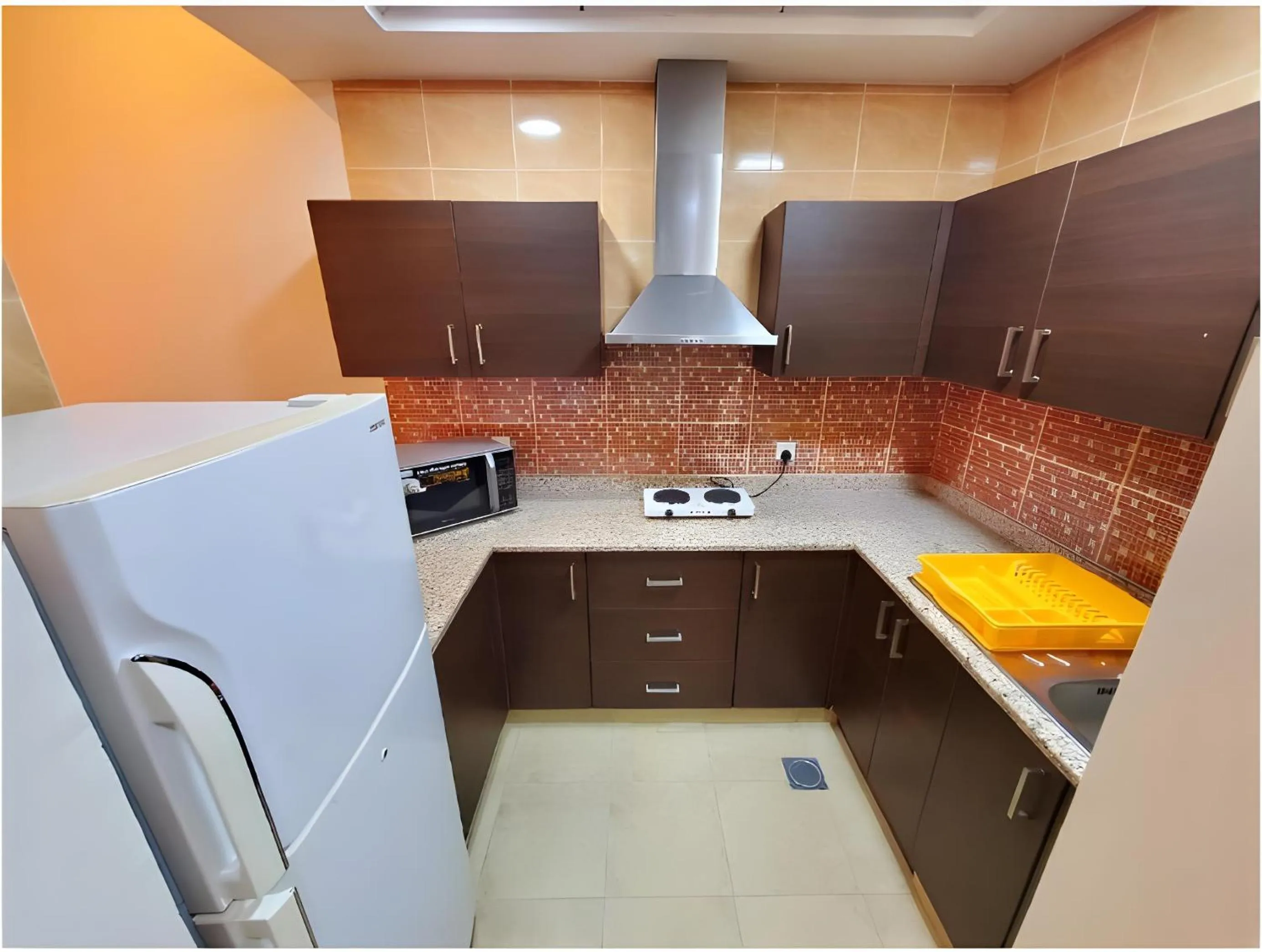 kitchen in Skylark Hotel Apartments AL Barsha