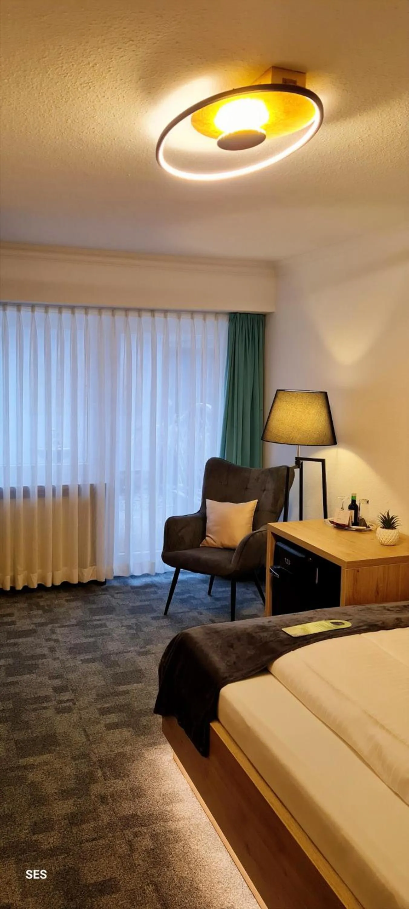 Photo of the whole room, Bed in Hotel Quellenhof