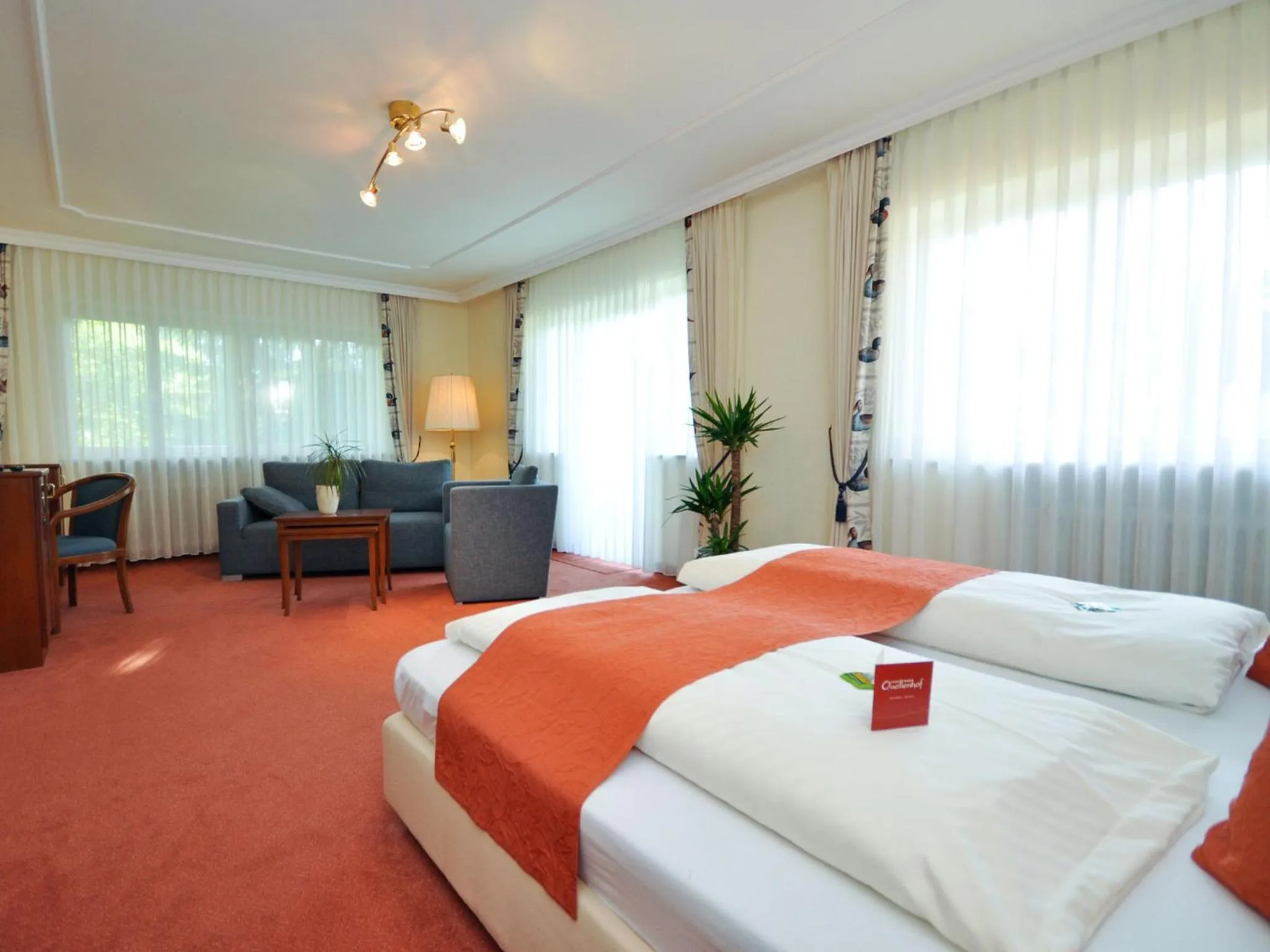 Photo of the whole room, Bed in Hotel Quellenhof