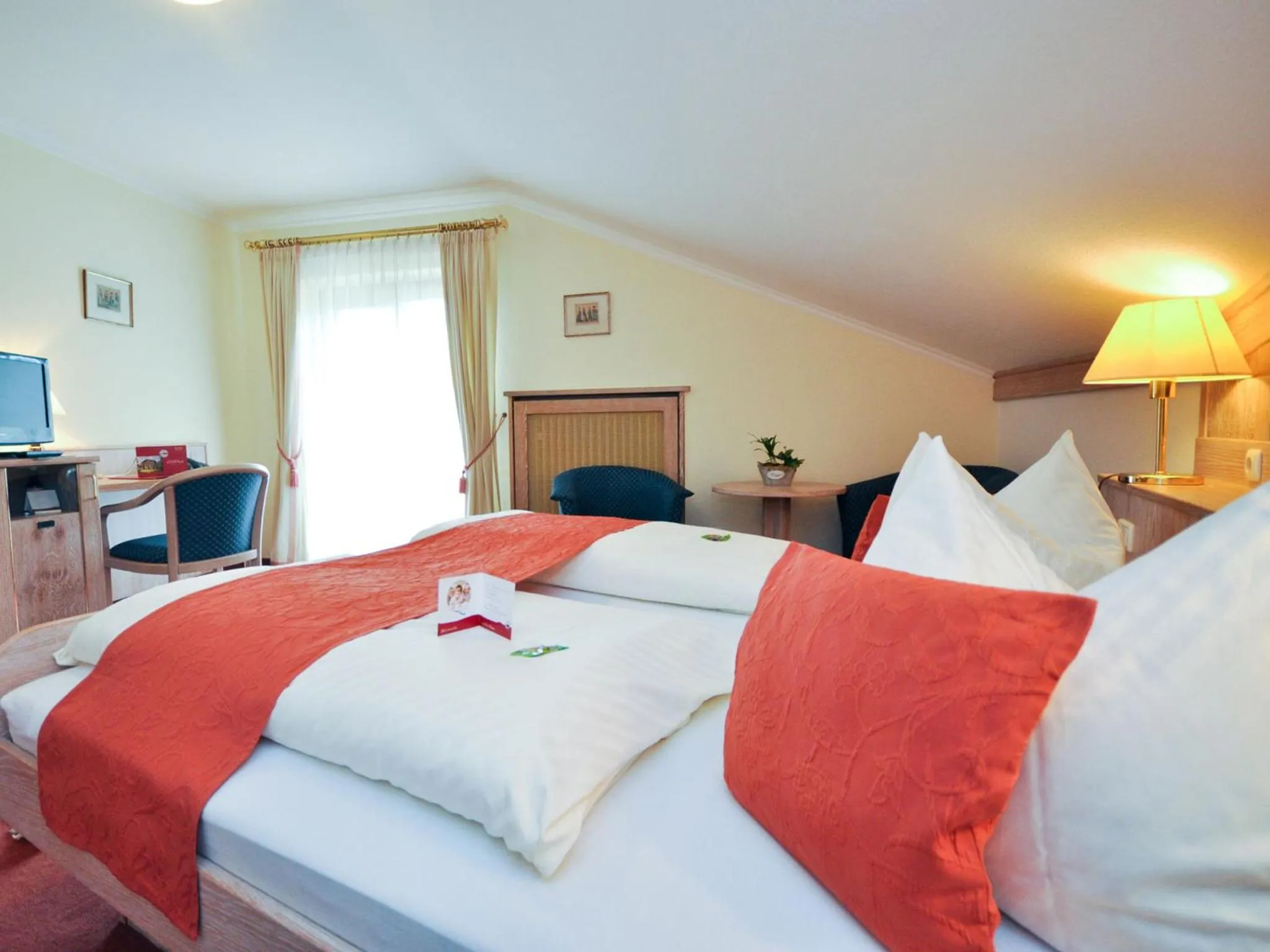 Bathroom, Bed in Hotel Quellenhof