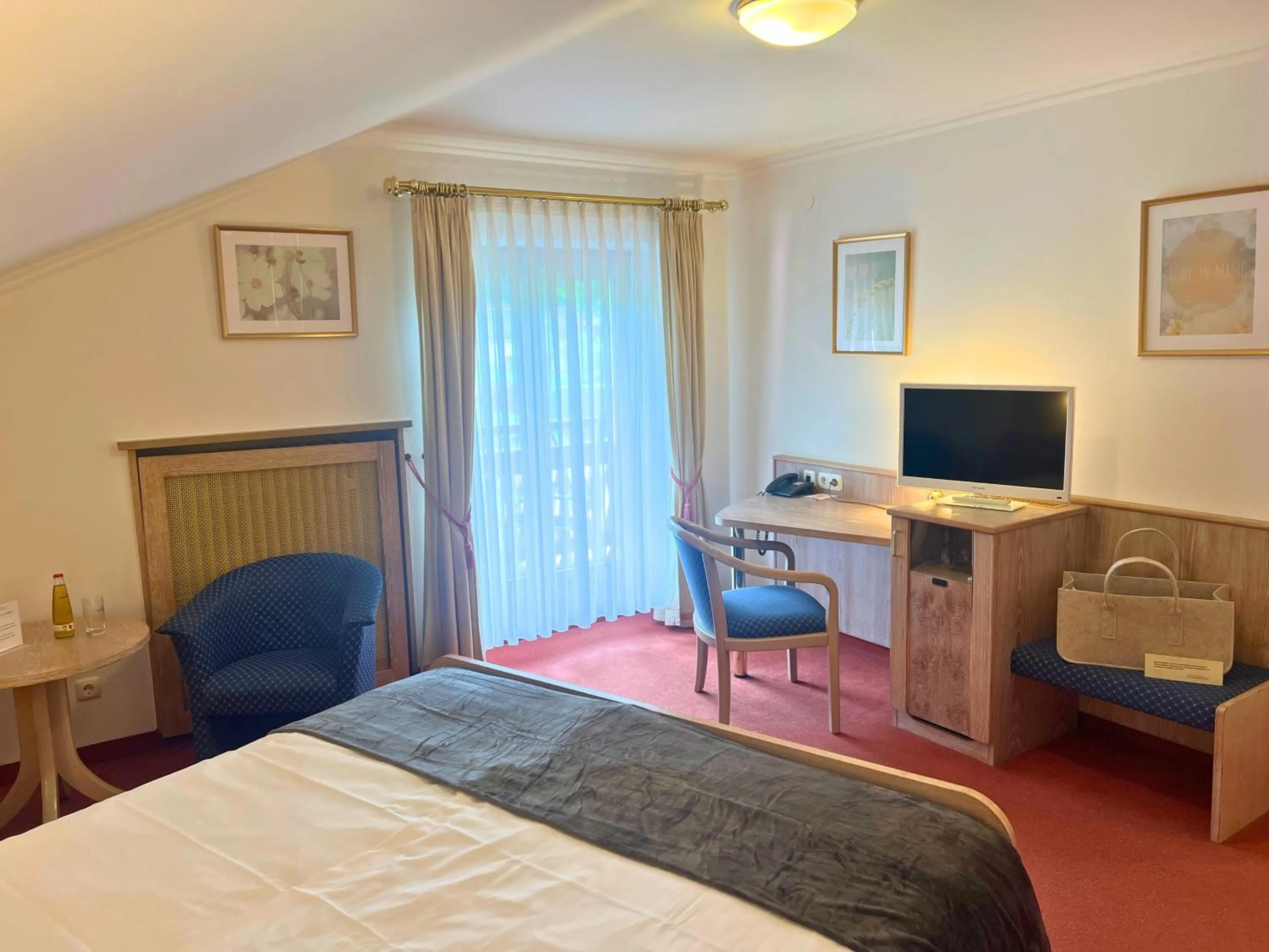 Photo of the whole room, Bed in Hotel Quellenhof