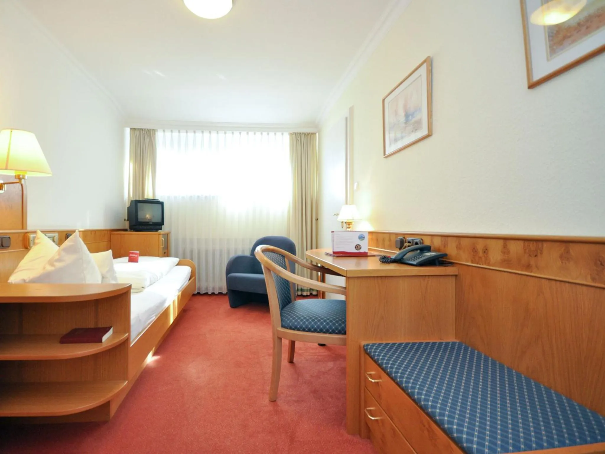 Photo of the whole room, Bed in Hotel Quellenhof