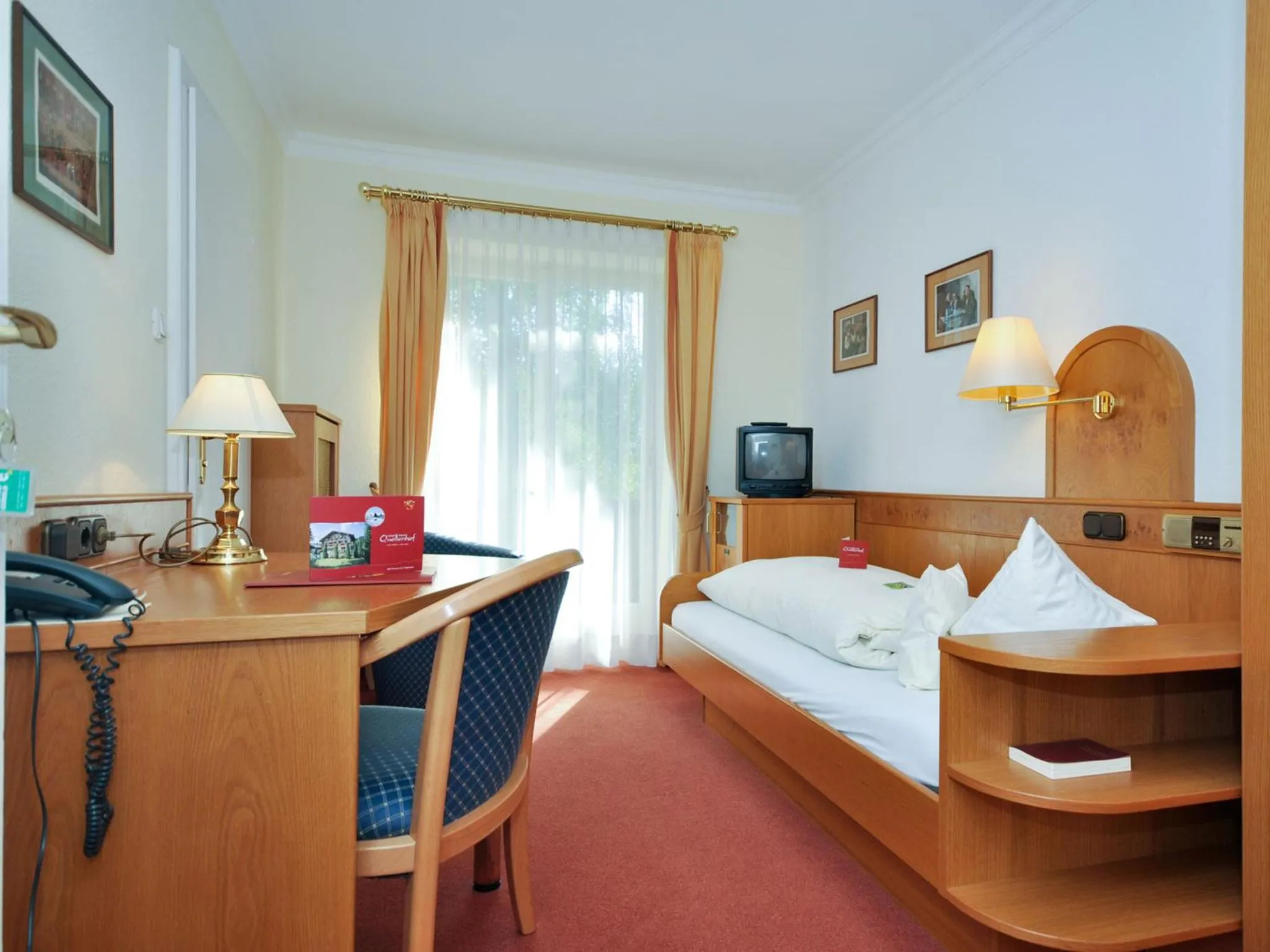 Photo of the whole room, Bed in Hotel Quellenhof