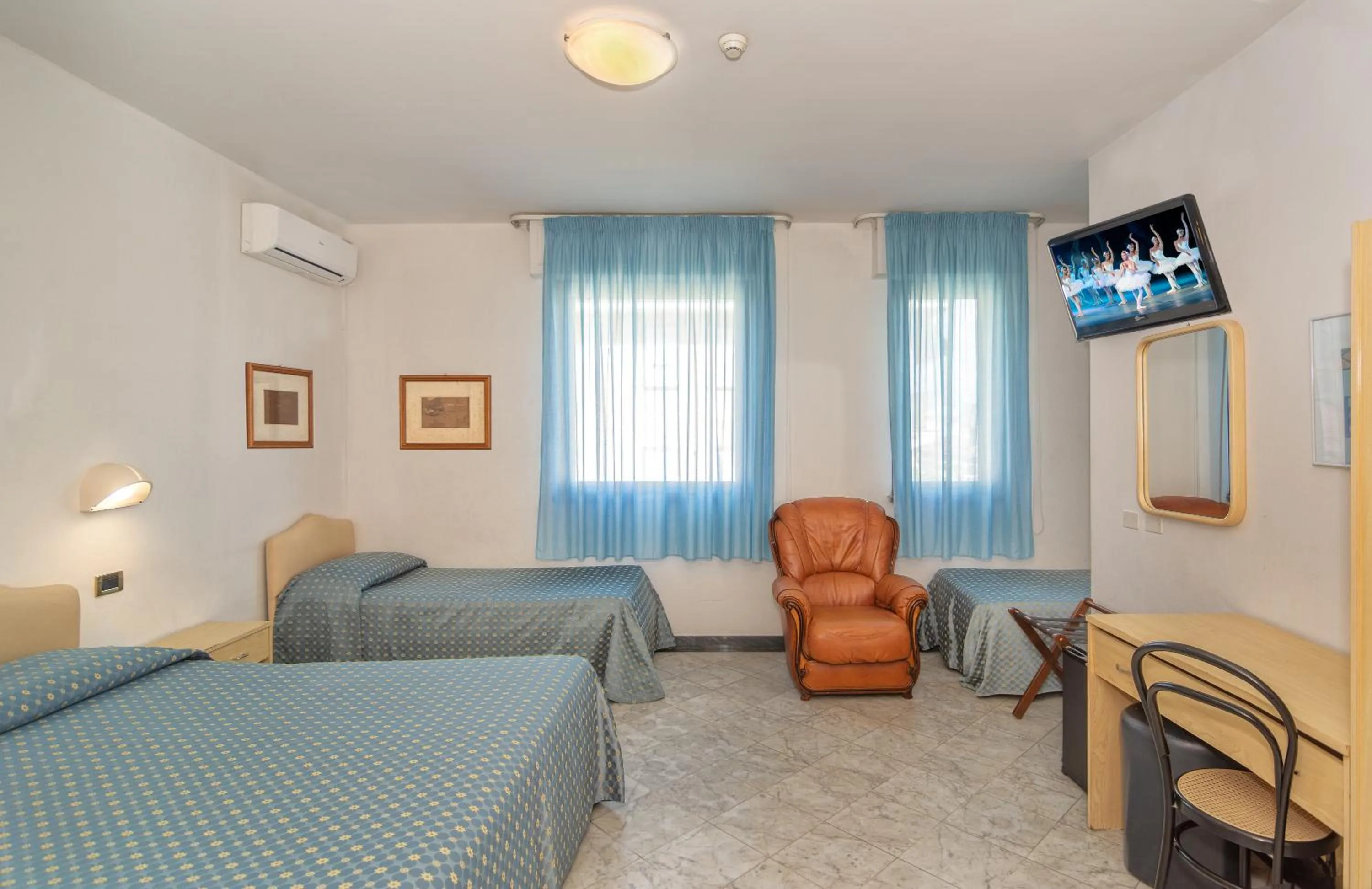 Bed in Hotel Mariotti