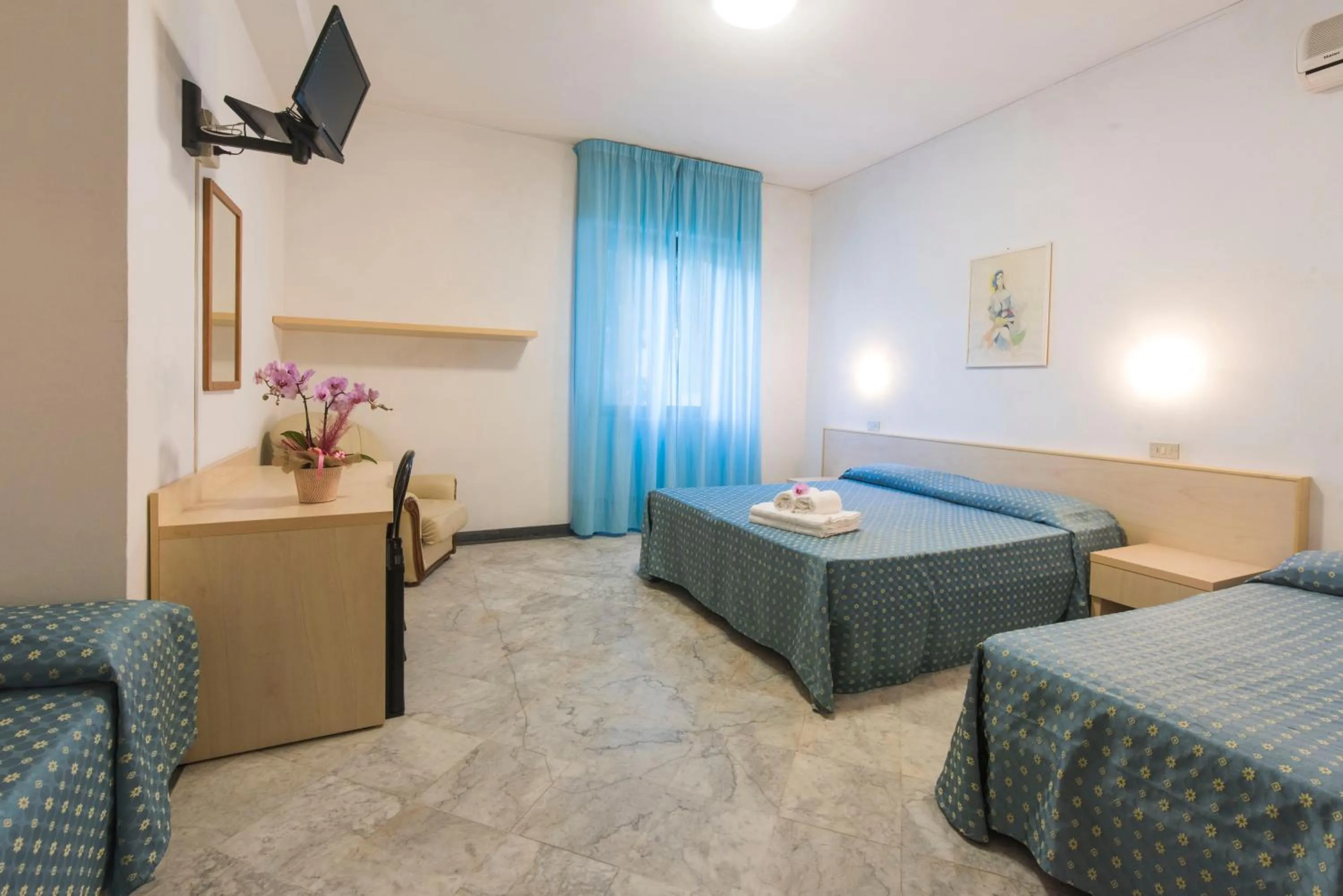 Bed in Hotel Mariotti