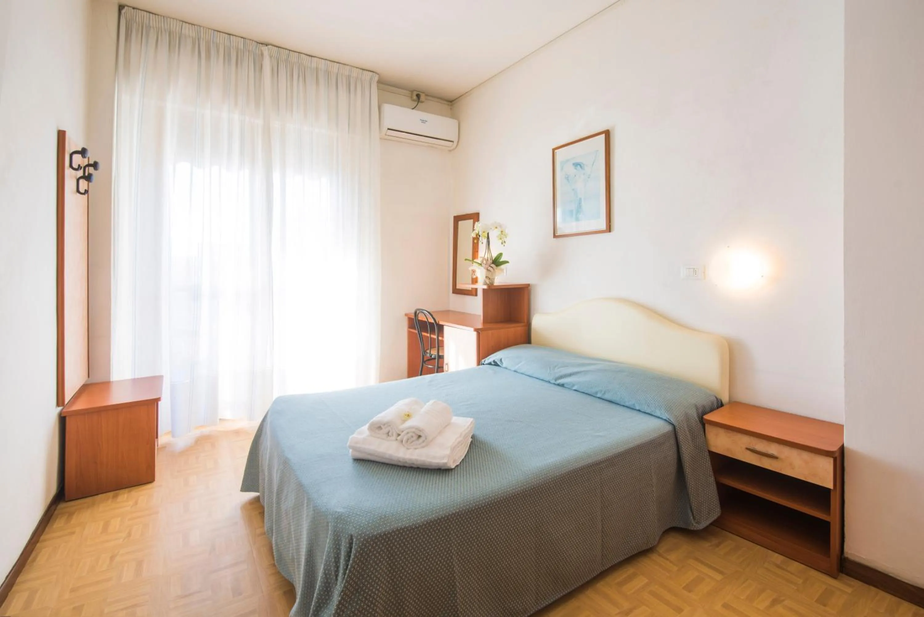 Bed in Hotel Mariotti