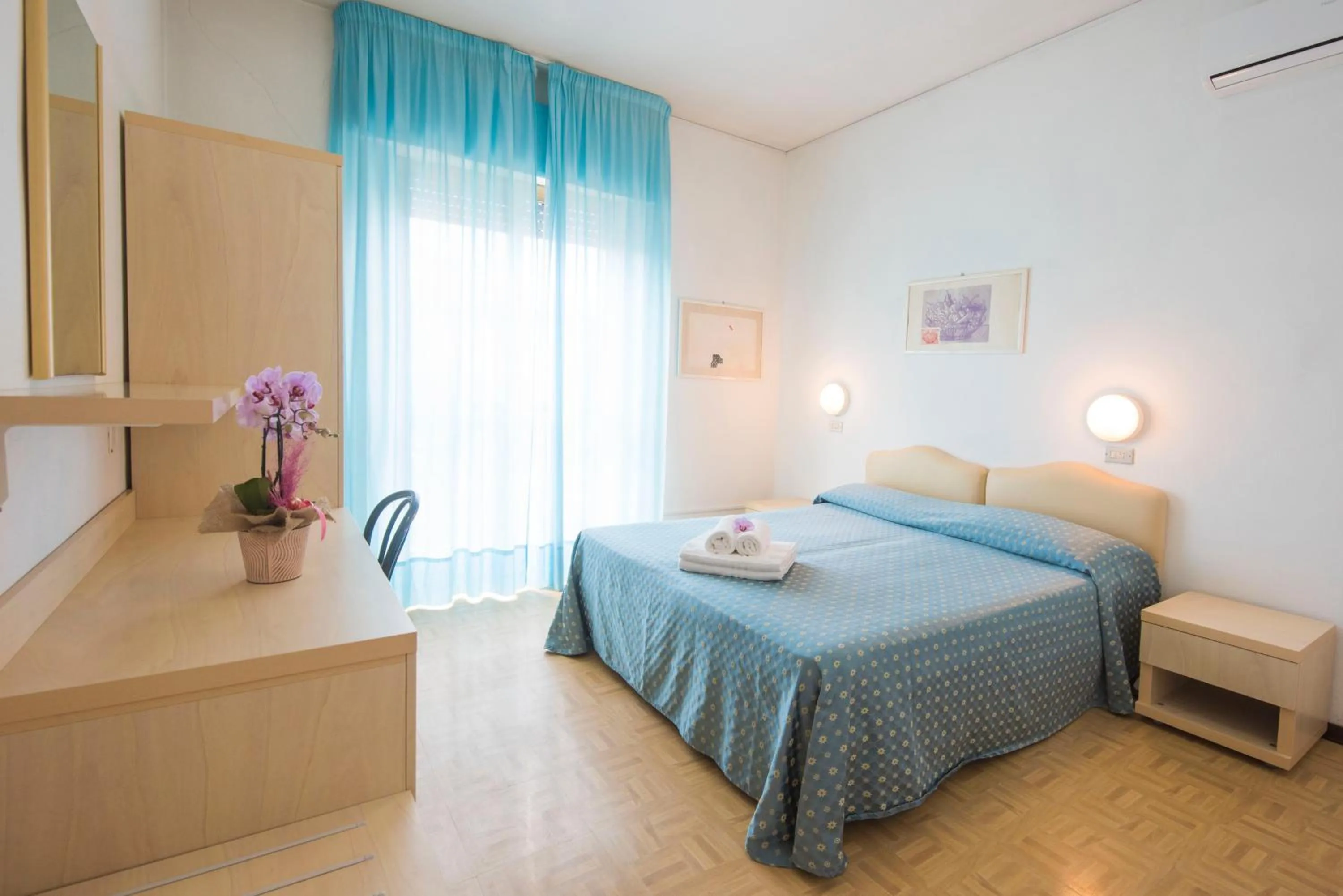 Bed in Hotel Mariotti