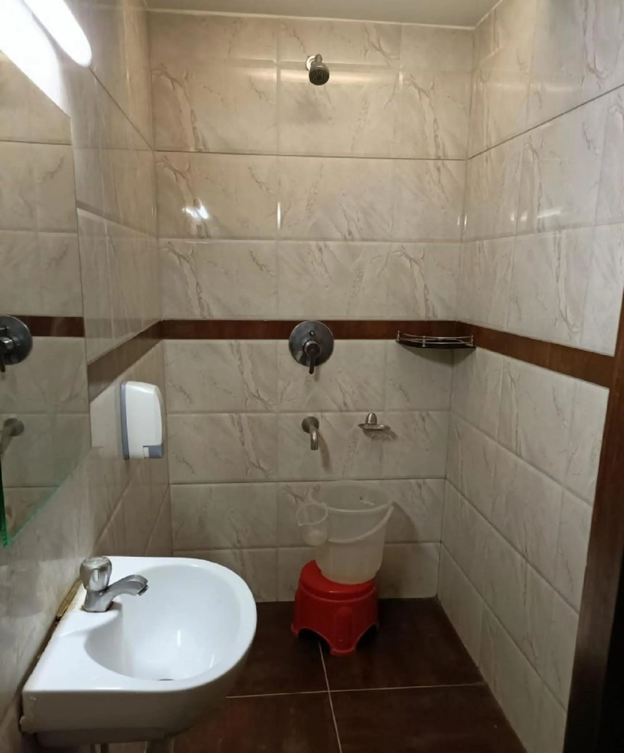 Bathroom in Hotel Darshan Vishwas
