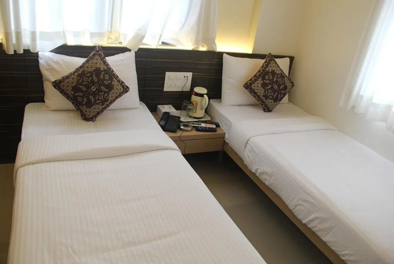 Bedroom, Bed in Hotel SaiPrasad Executive Solapur