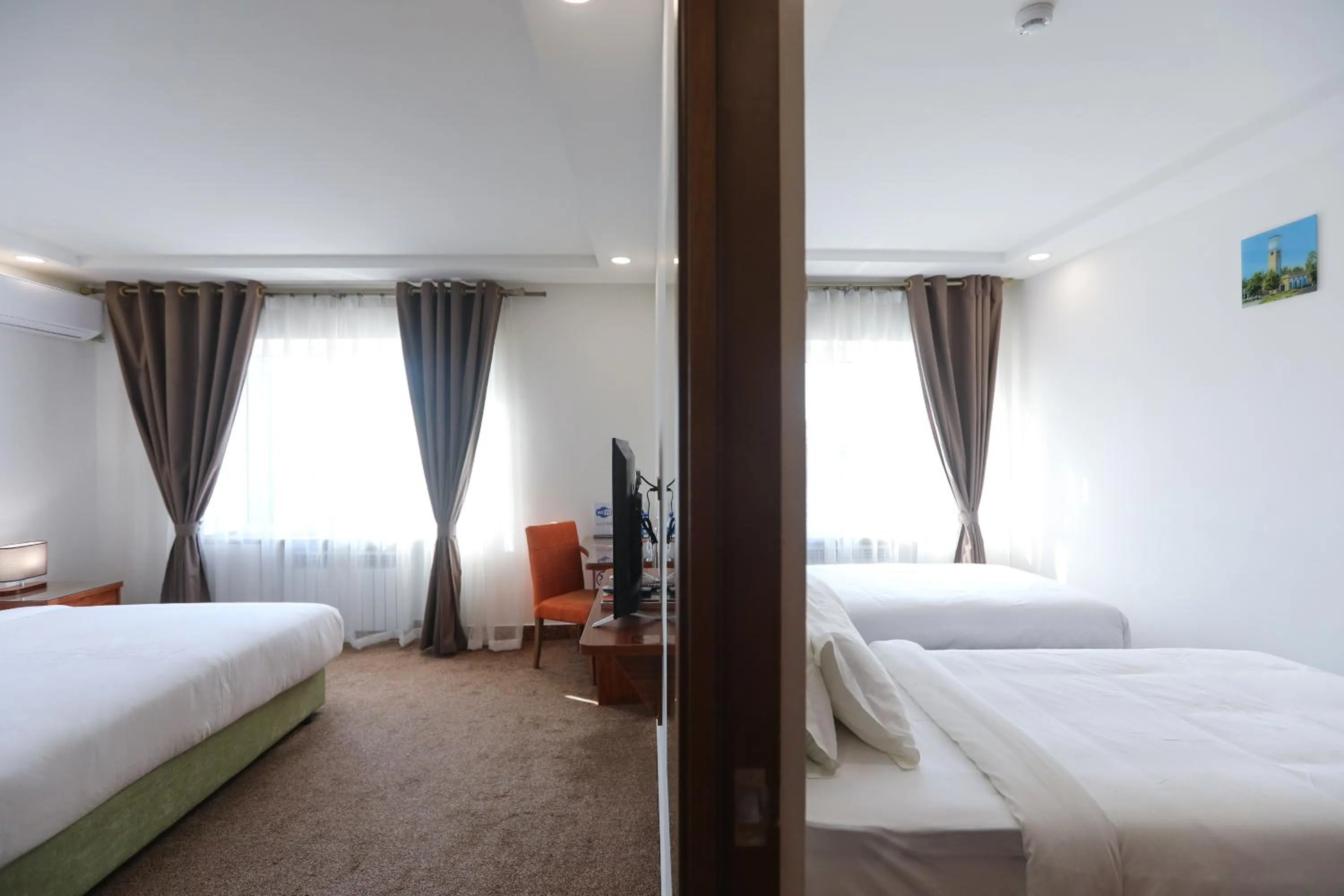 Bed in Sunrise Hotel