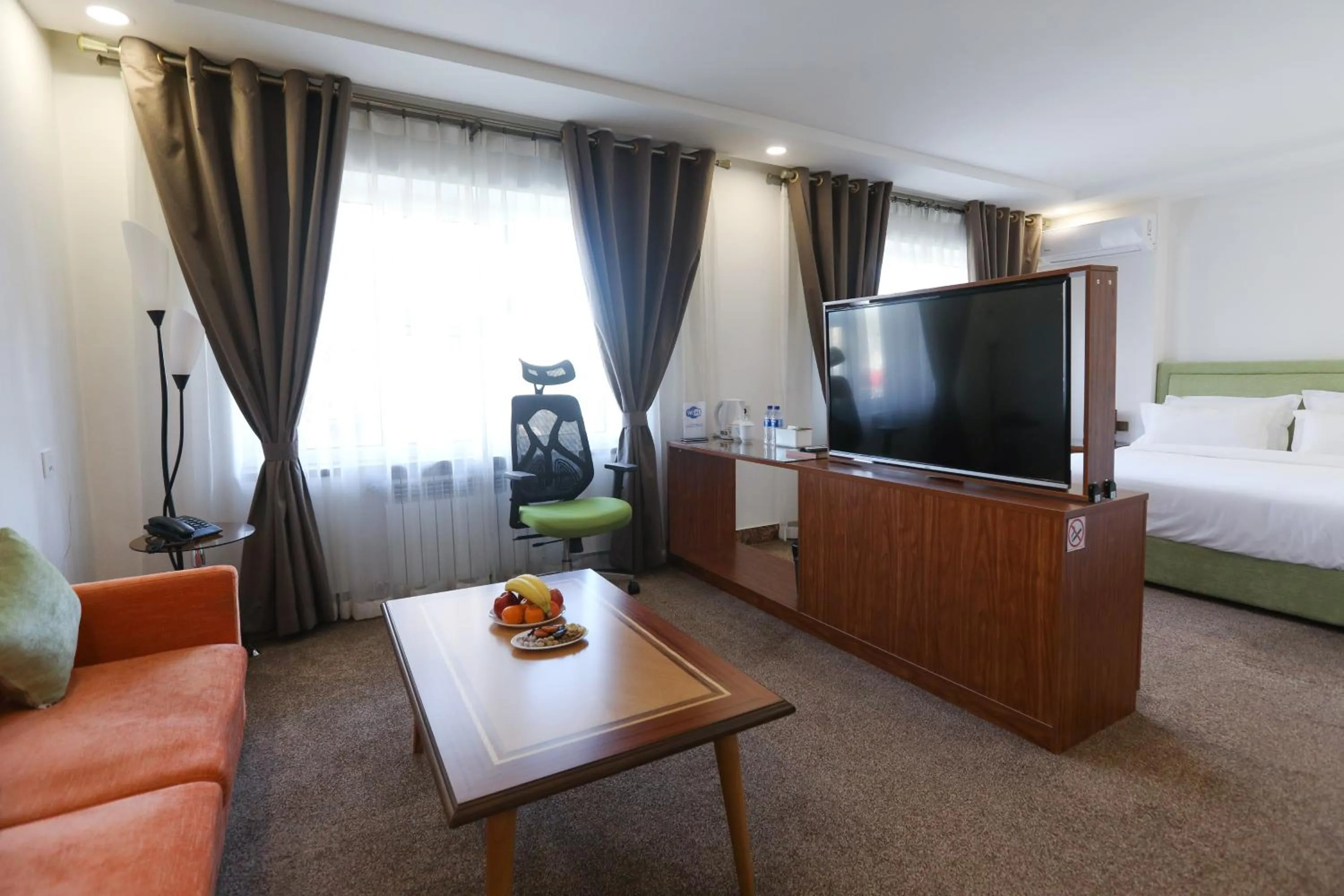 Bed in Sunrise Hotel