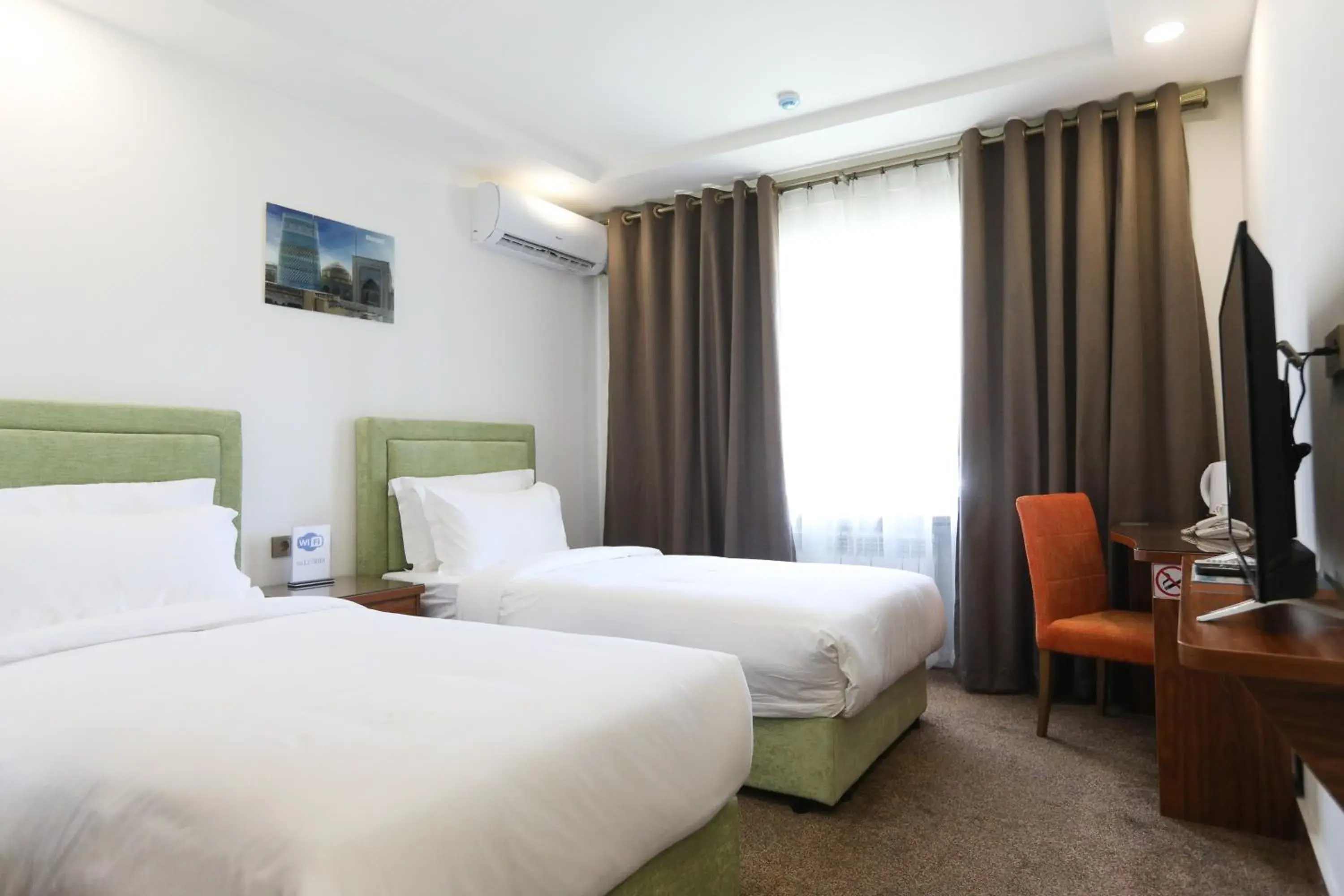 Double or Twin Room with City View in Sunrise Hotel Double or Twin Room with City View in Sunrise Hotel