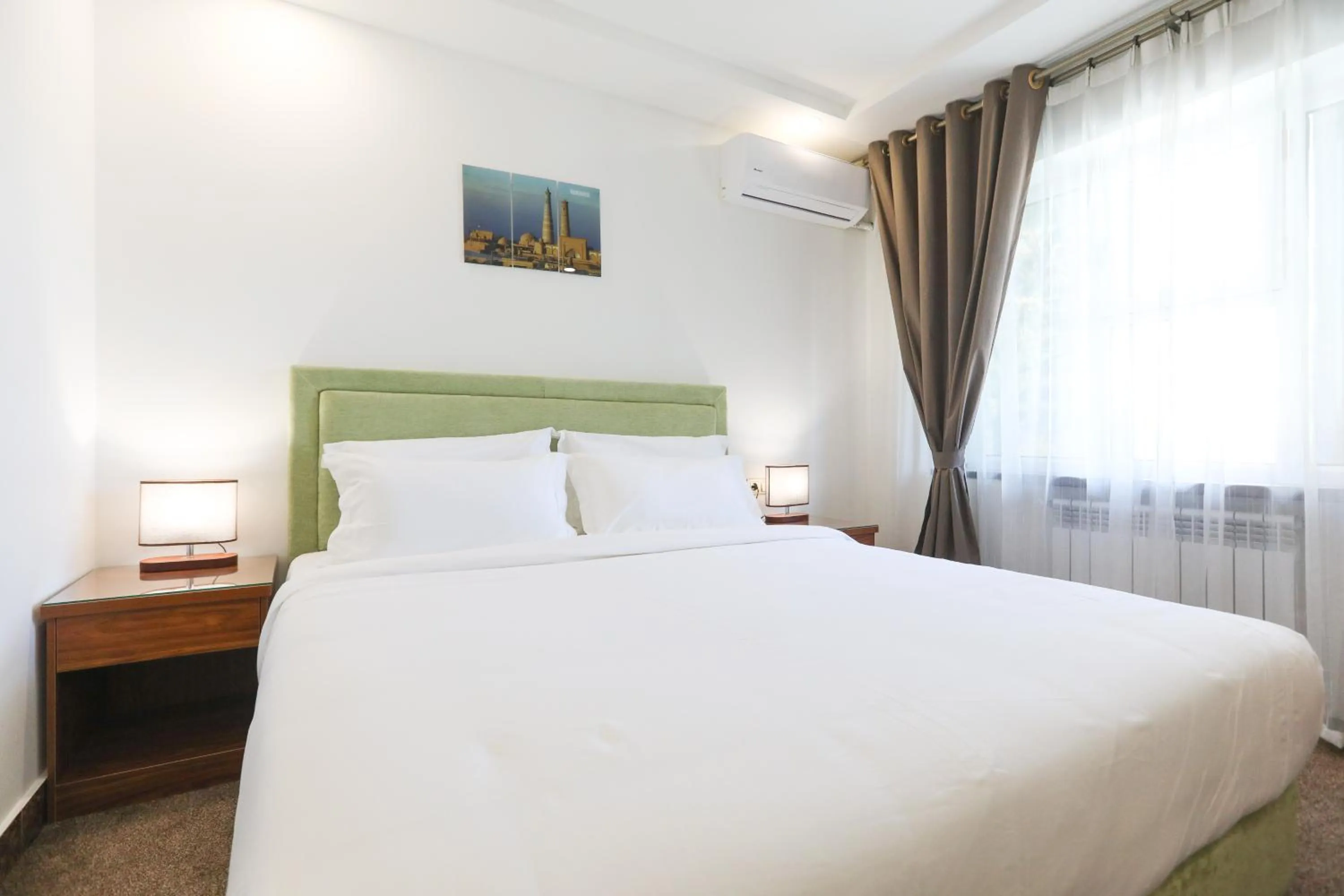 Bed in Sunrise Hotel