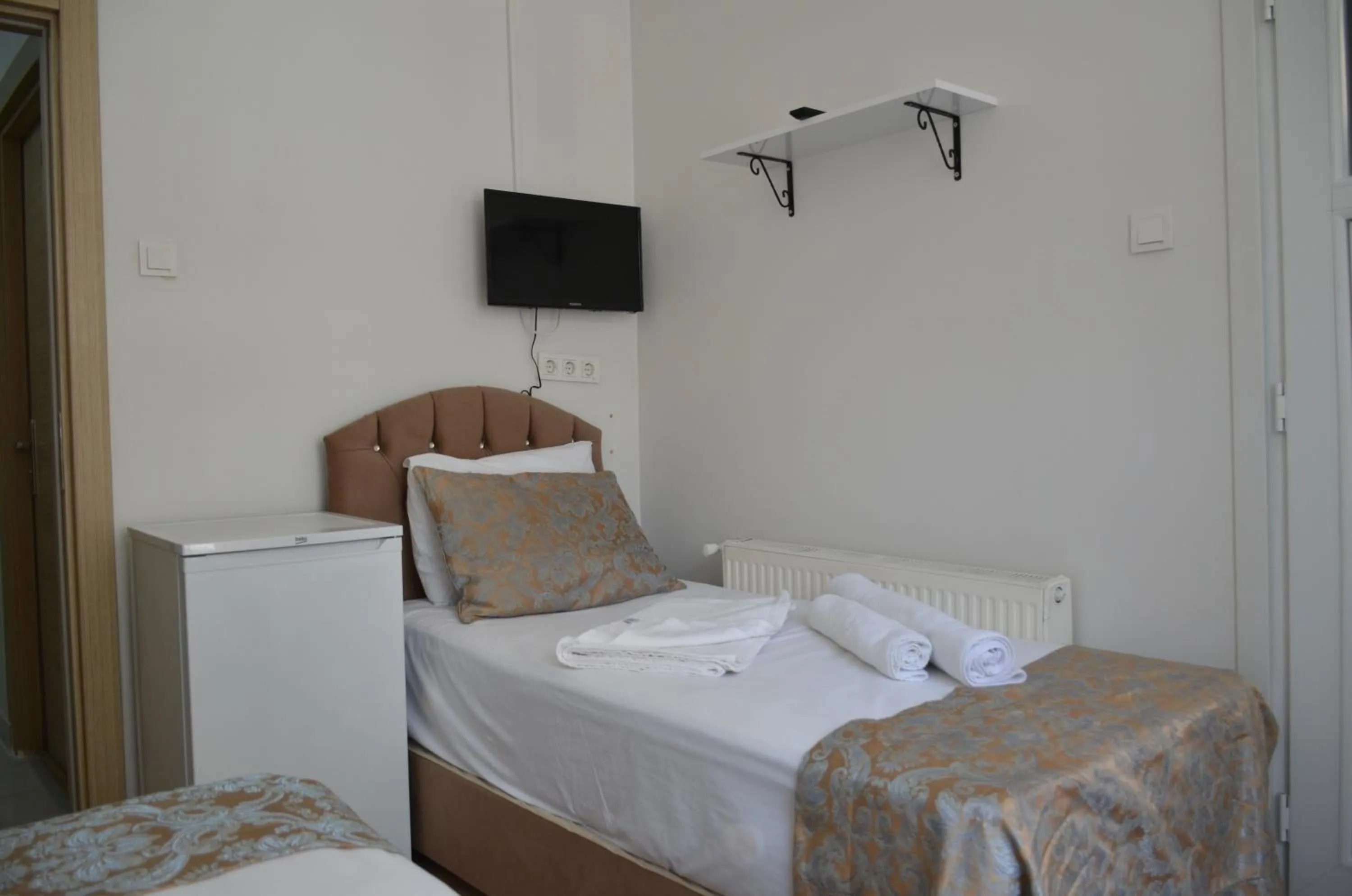 Bed in TABRİZ HOTEL