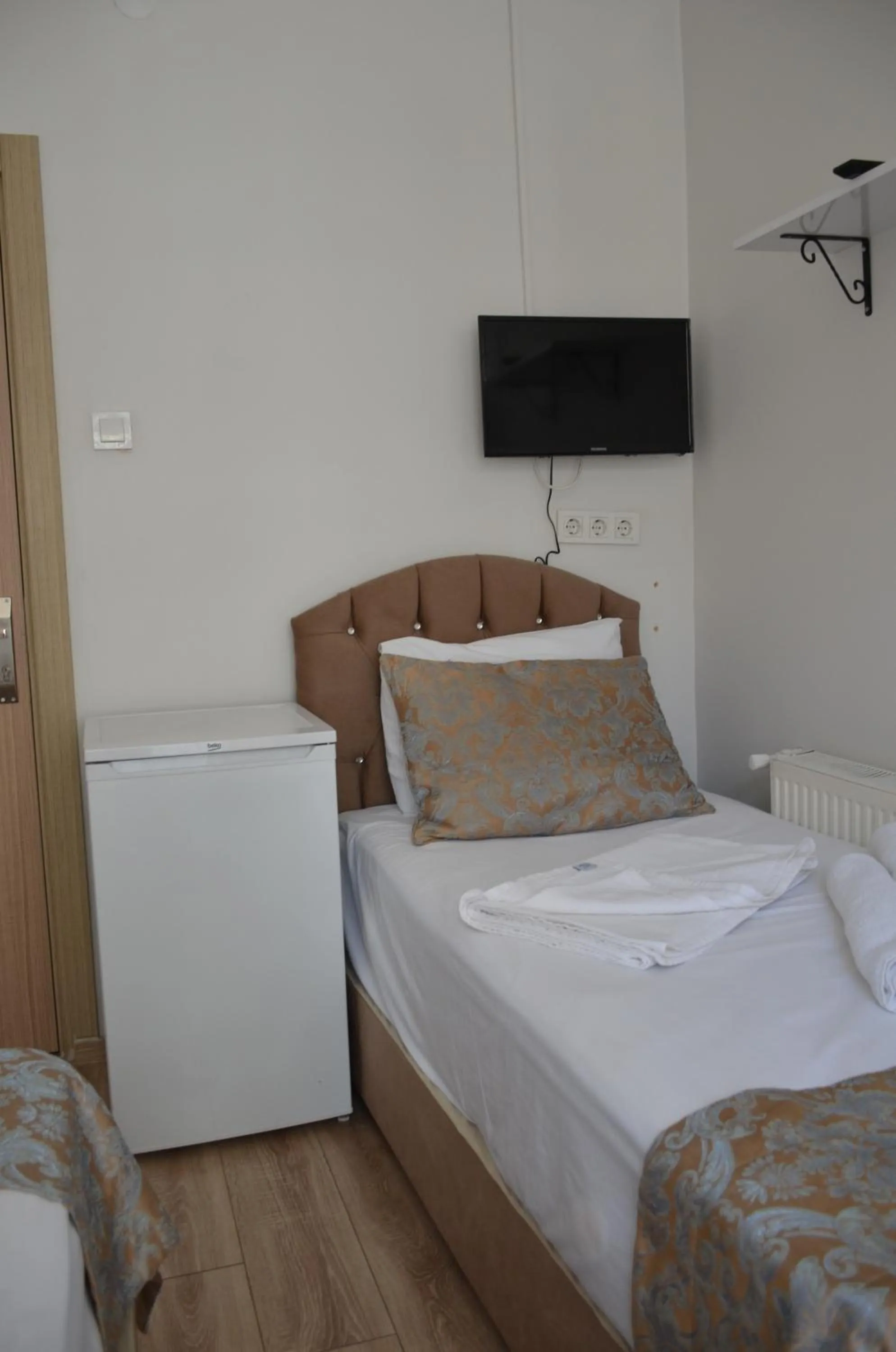 Bed in TABRİZ HOTEL