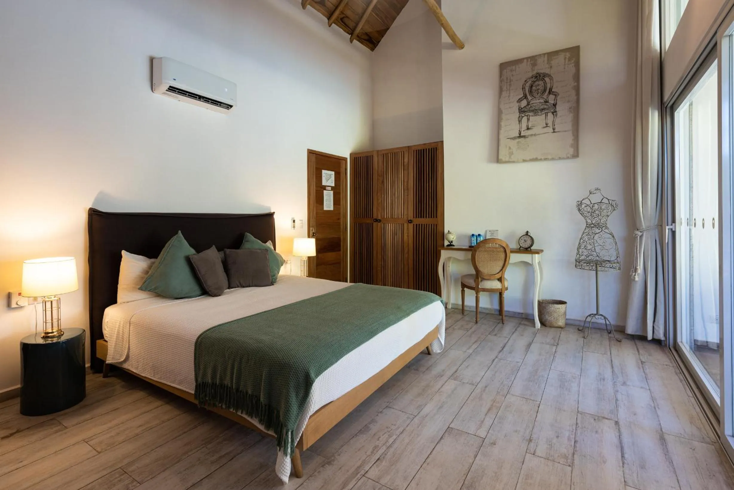 Bed in TAKUMA BOUTIK HOTEL